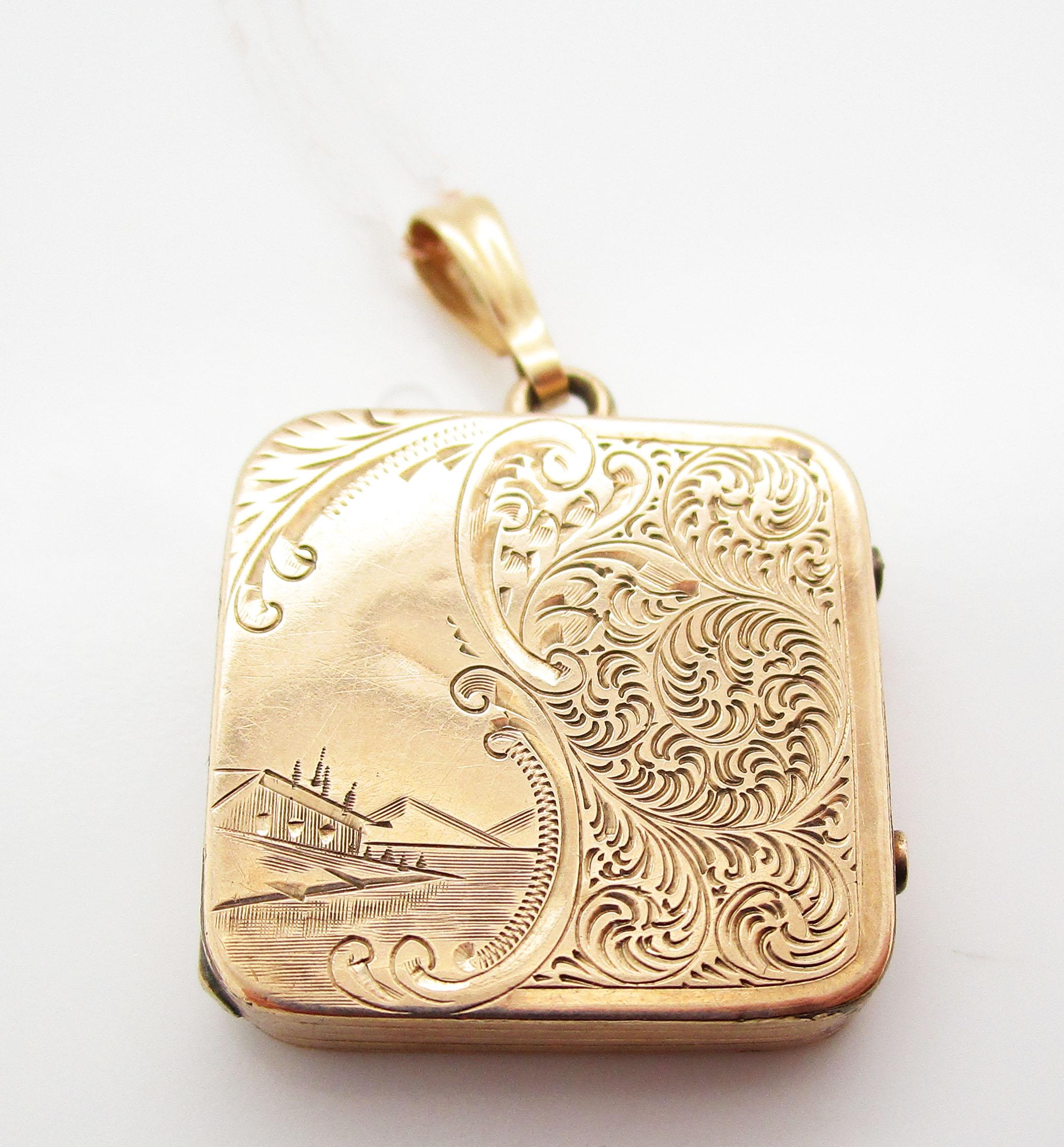 This is an absolutely lovely Victorian locket in 14k rose gold in a timeless square shape hand engraved with a stunningly detailed pattern! The front of the locket is engraved with a gorgeous swirling design on one half, while the other half of the
