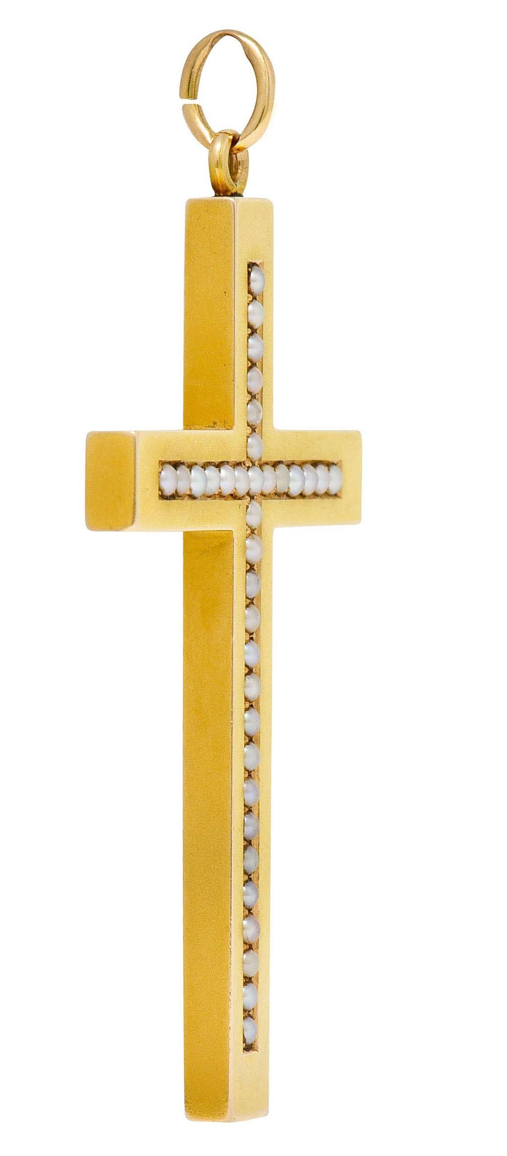 Substantial cross pendant is designed with dimension and sleek geometry

Set with well matched 2.0 mm natural freshwater pearls

Cream in body color with strong silver overtones and very good to excellent luster

Stamped 14K for 14 karat