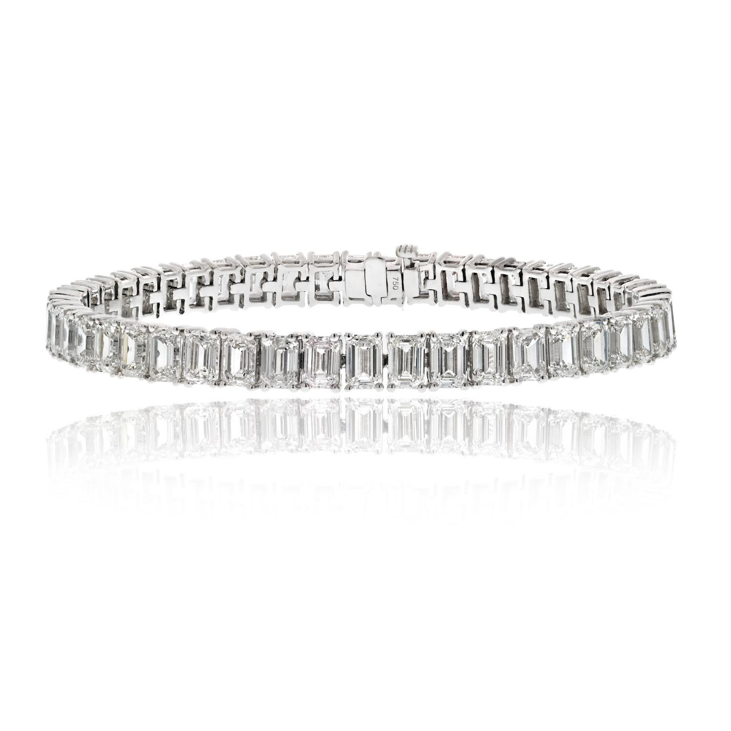 Elevate your elegance with our 18K White Gold 19.00cttw Emerald Cut Diamond Straight Line Tennis Bracelet. This exquisite piece is a testament to timeless sophistication and impeccable craftsmanship. 7 inches long. 

Crafted in lustrous 18K white