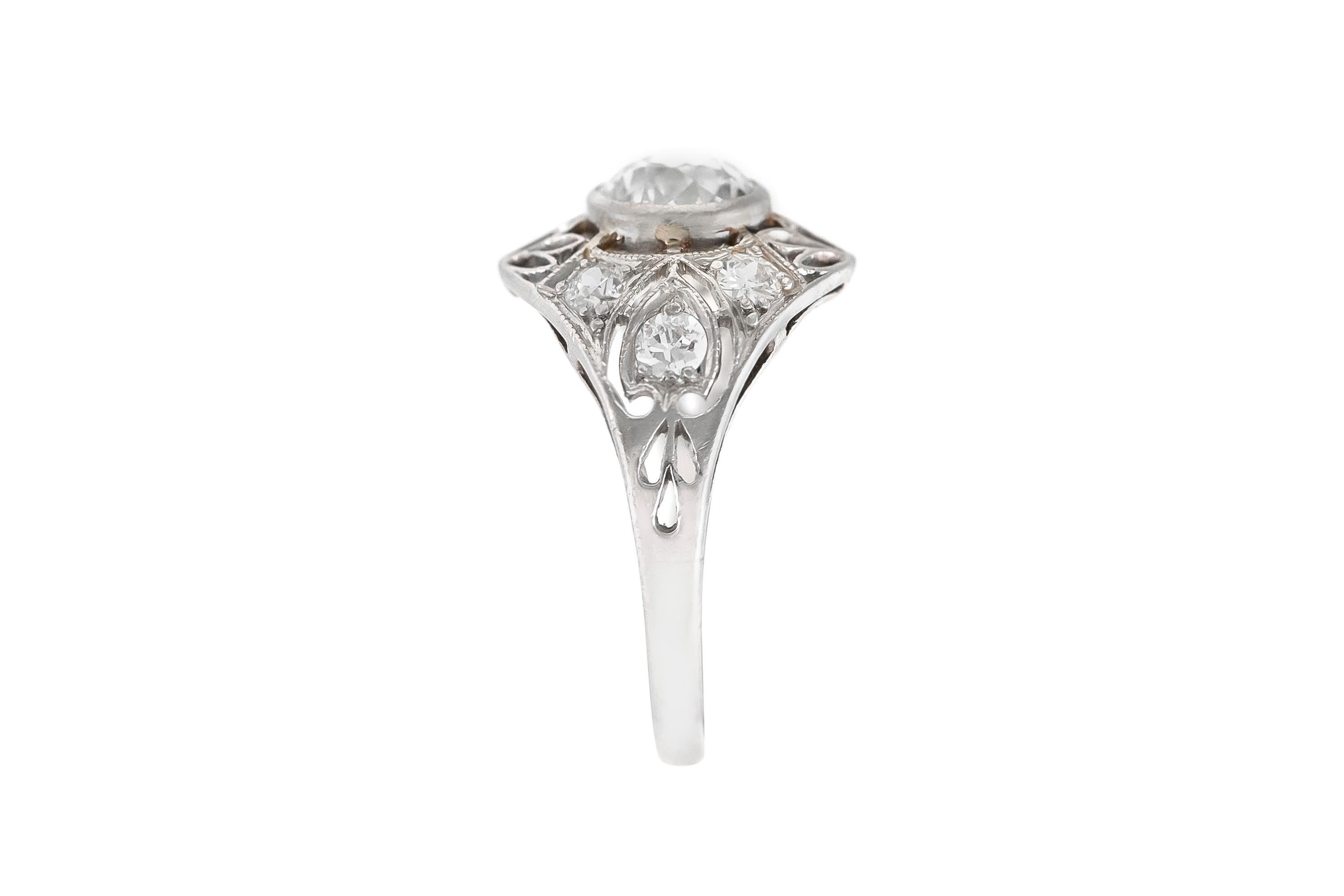 The ring is finely crafted in platinum with diamonds weighing approximately total of 1.00 center diamond and 0.40 more around diamonds .
Size 7.00 ( easy to resize)
Circa 1900.