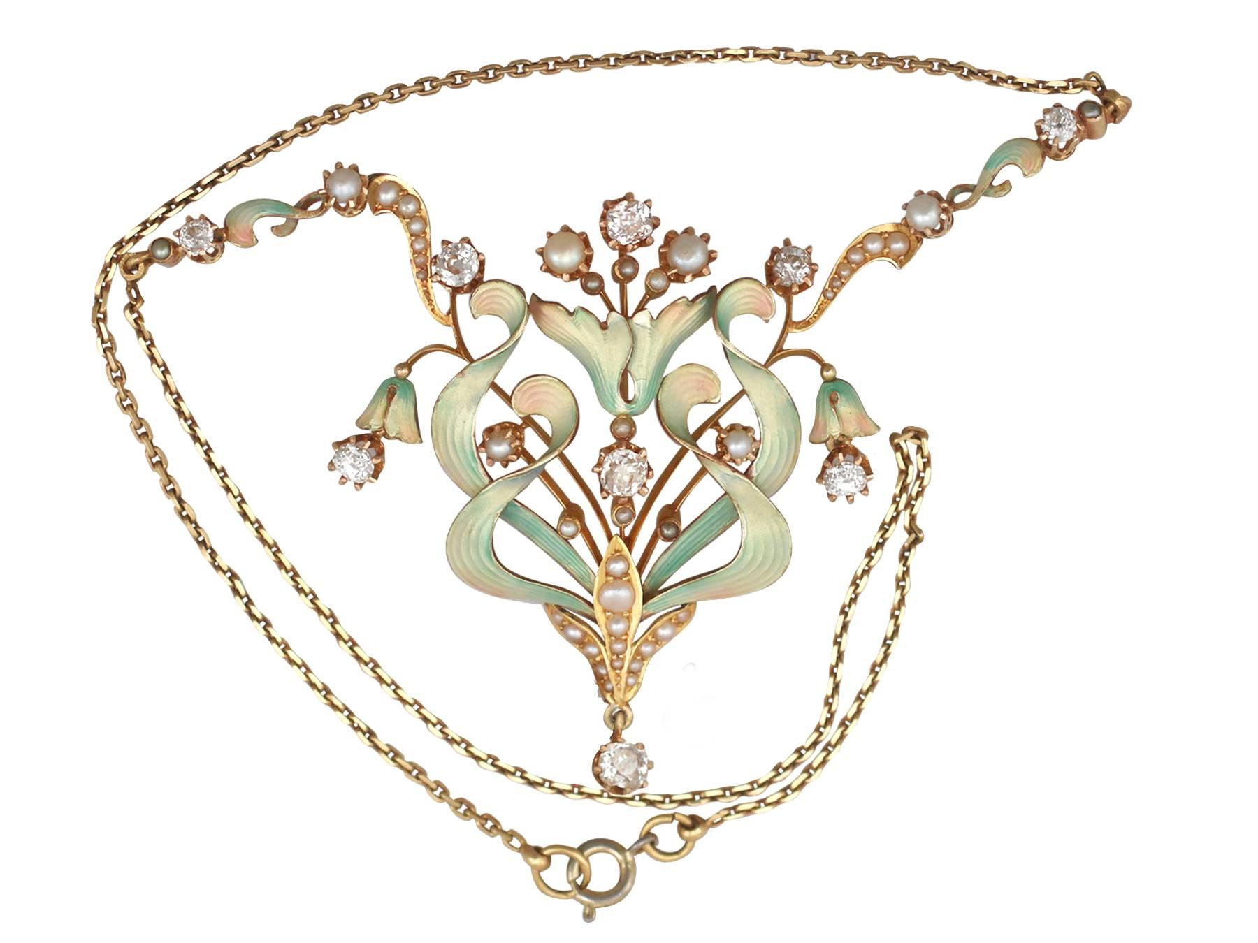 A stunning antique Art Nouveau 1.42 carat diamond and seed pearl, enamel and 15 karat yellow gold necklace; part of our diverse antique jewelry and estate jewelry collections

This stunning, fine and impressive Art Nouveau antique necklace has been