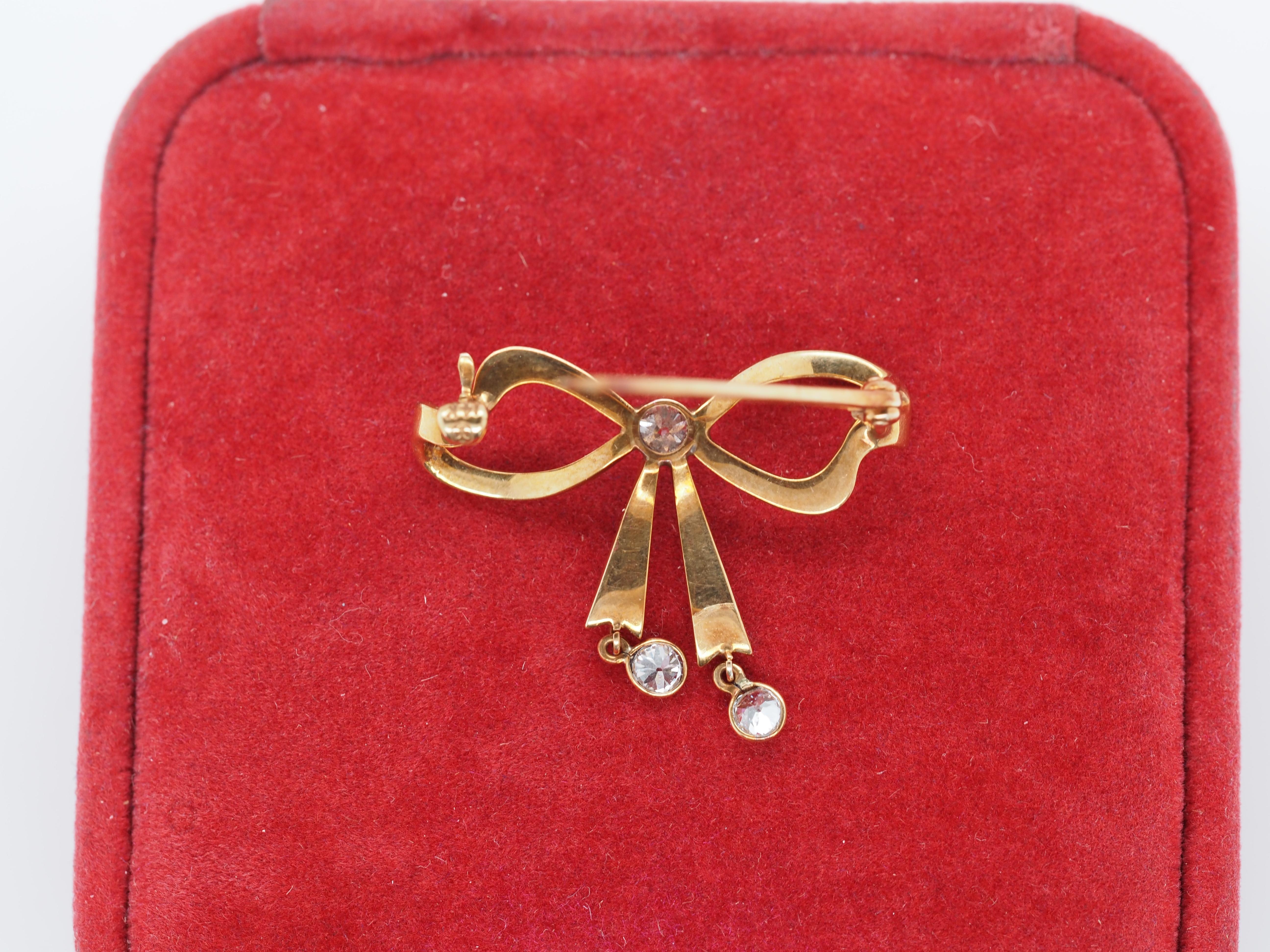 1900s 14k Rose Gold Pearl and Old European Cut Diamond Ribbon Bow Brooch In Good Condition For Sale In Atlanta, GA