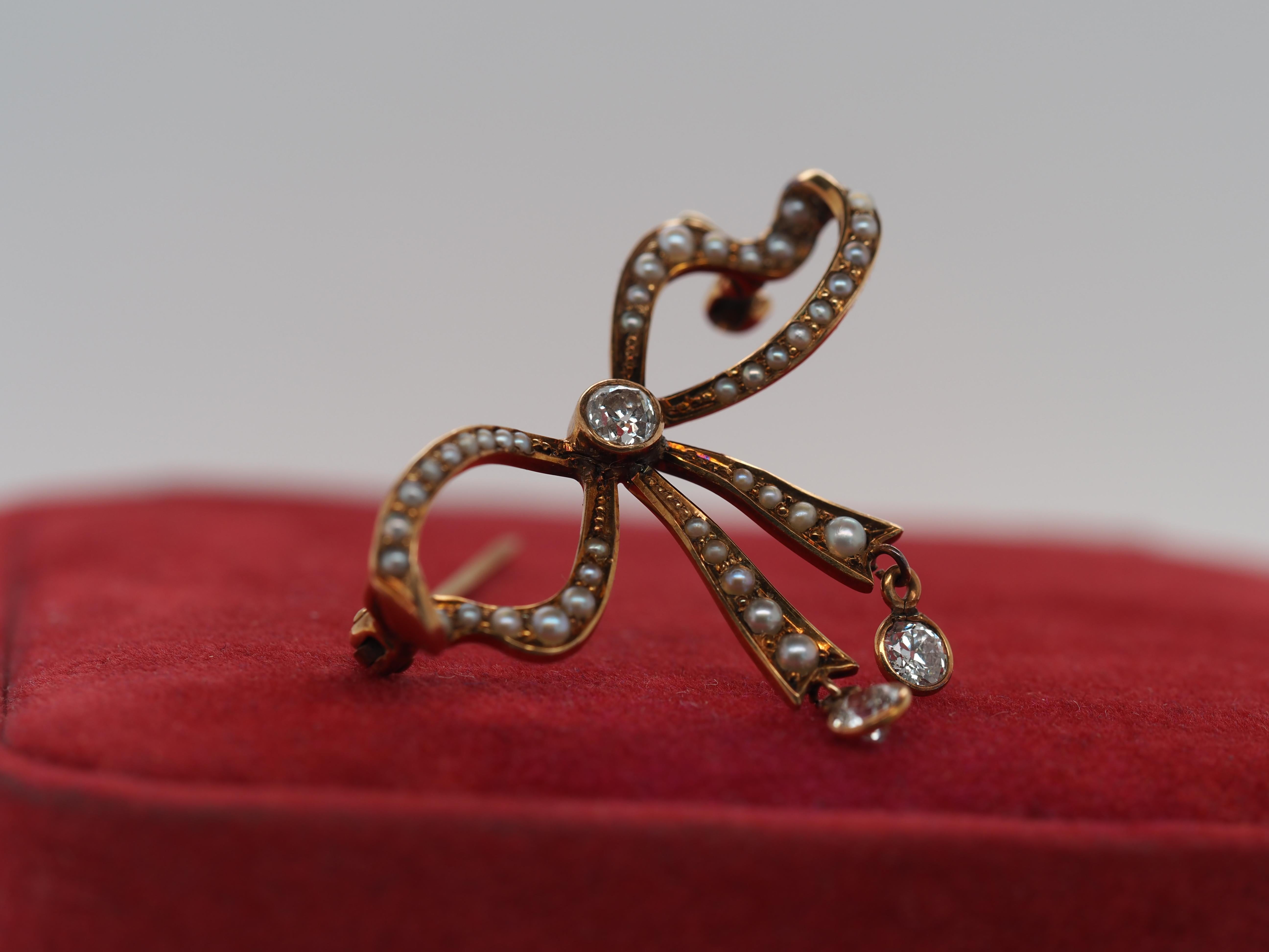 Women's or Men's 1900s 14k Rose Gold Pearl and Old European Cut Diamond Ribbon Bow Brooch For Sale