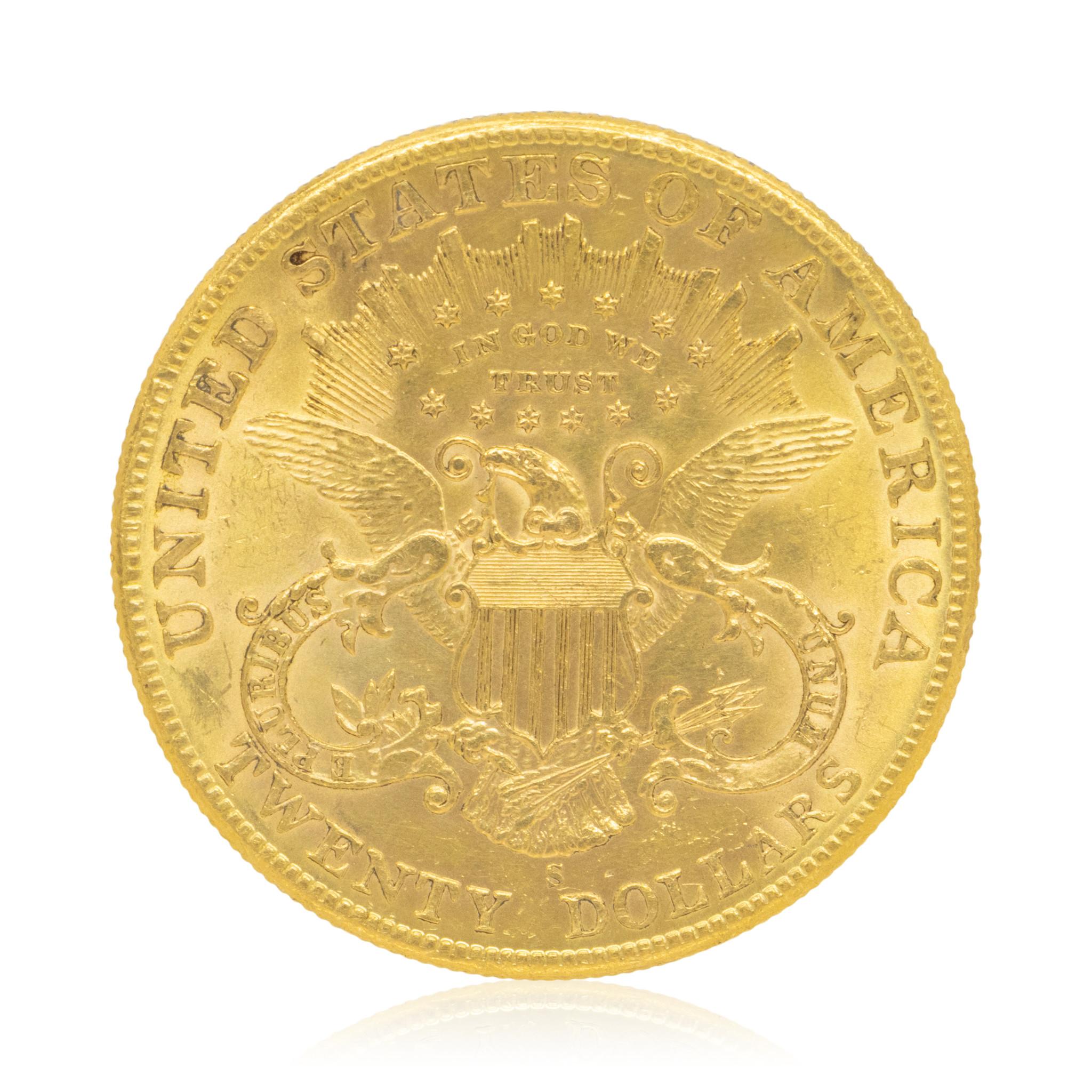 $20 dollar Liberty gold coin. One side of the coin features the head of Lady Liberty, the reverse features the seal of the United States 