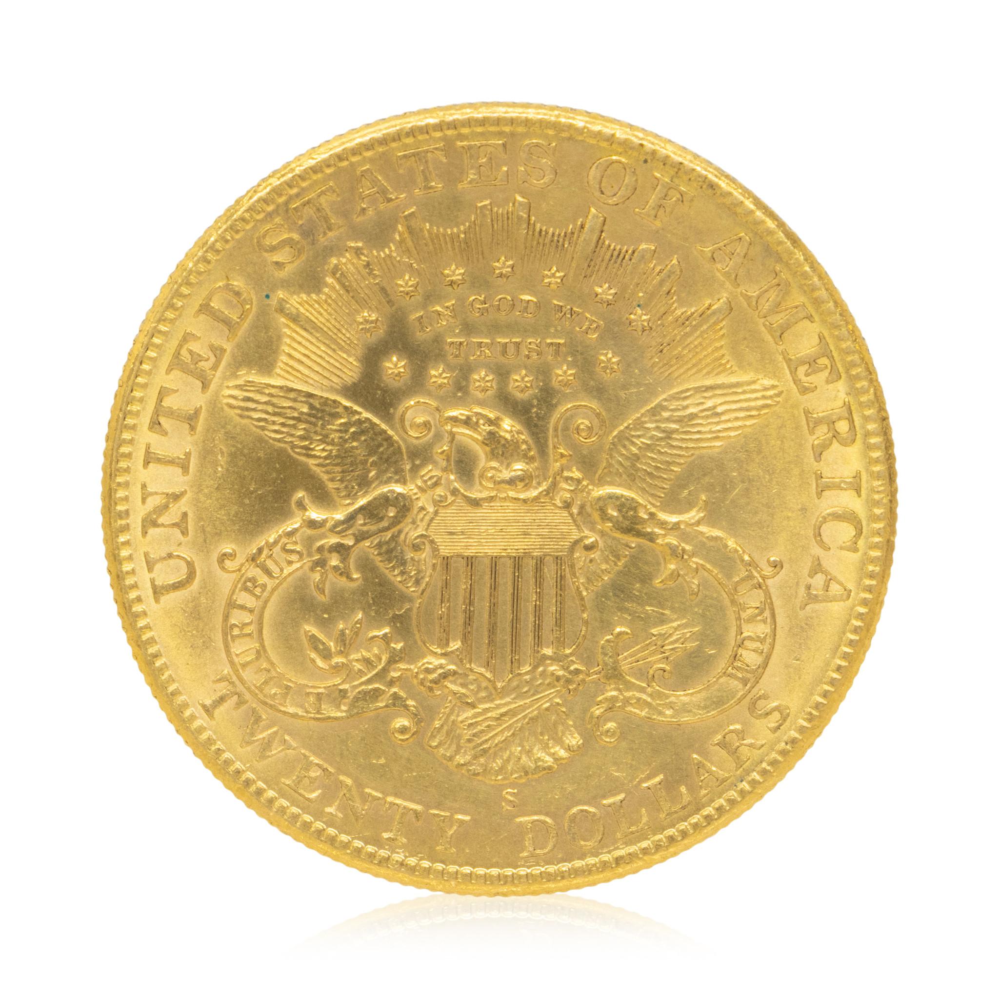 $20 dollar Liberty gold coin. One side of the coin features the head of Lady Liberty, the reverse features the seal of the United States 