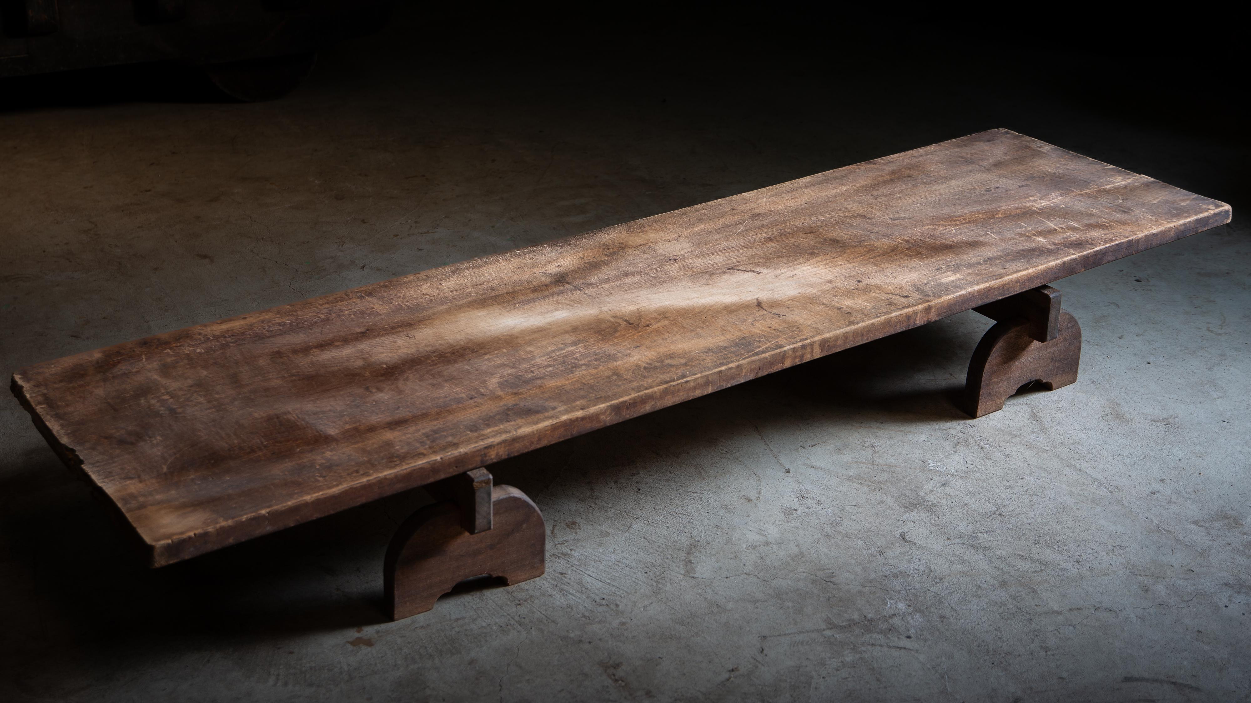 The long low table - set of extra long single solid wood board & wooden leg parts.

The tabletop is a single solid wood board of Magnolia (Hounoki), which was commonly used for Tachidai (tachi-ita / okidai), kimono-sewing table.
Made as a product in