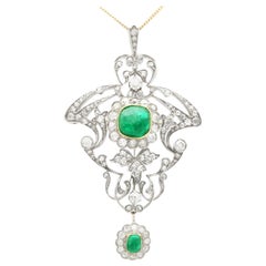 Anhänger/Brosche aus Gold mit 3,53 Karat Smaragd im Cabochon-Schliff und 5,89 Karat Diamanten, 1900er Jahre