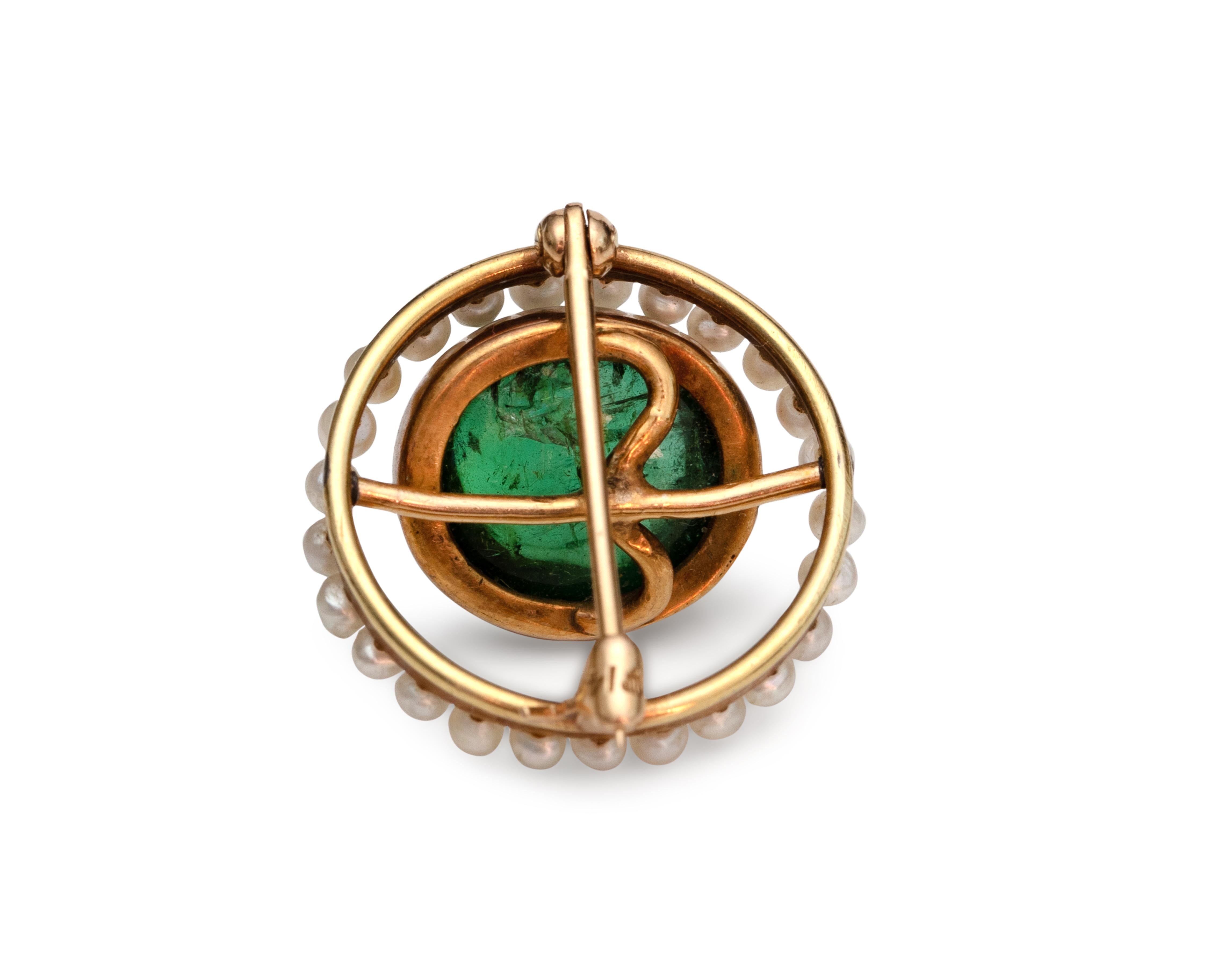 Item Details:
Metal type: 14 Karat Yellow Gold
Weight: 4.6 grams
Measures: .75 Inches

Gemstone Details - Tourmaline in the Center
Color: Rich green 
Carat: 4 Carats
Cut: Round
The tourmaline is bezel set in a beautiful 14 karat gold basket

The