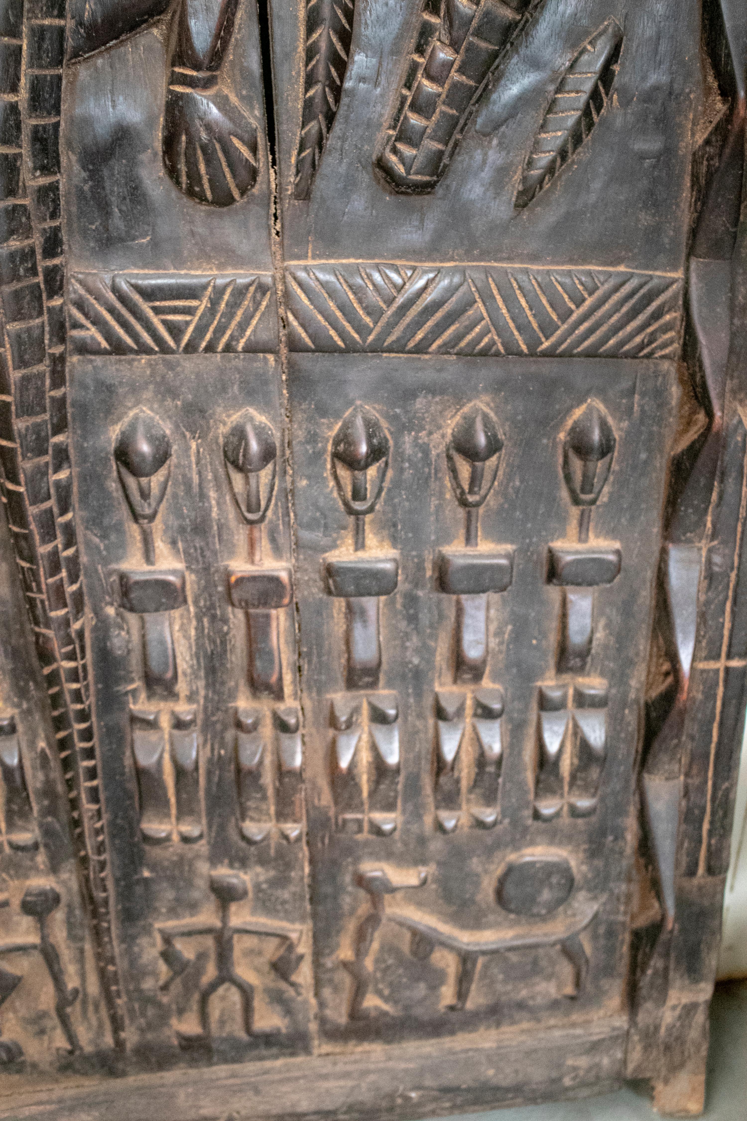 1900s African Wooden Door with Hand Carved Ethnic Human and Animal Relief 6