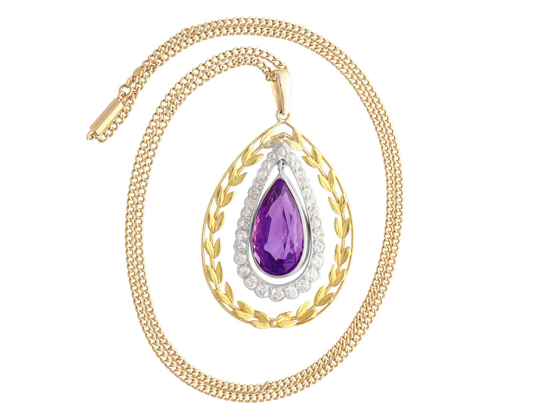 A stunning, fine and impressive antique 10.88 carat amethyst and 1.88 carat diamond 18 karat yellow gold and silver set pendant; part of our antique jewelry and estate jewelry collections.

This stunning, fine and impressive antique pendant has been