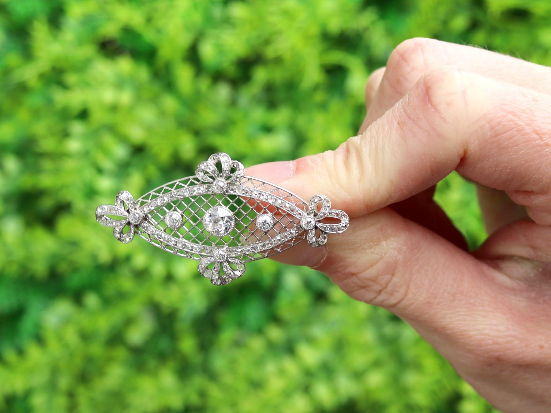 A stunning antique 1900s 1.84 carat diamond and platinum brooch; part of our diverse antique jewelry and estate jewelry collections.

This stunning, fine and impressive diamond brooch has been crafted in platinum.

The pierced decorated, oval shaped