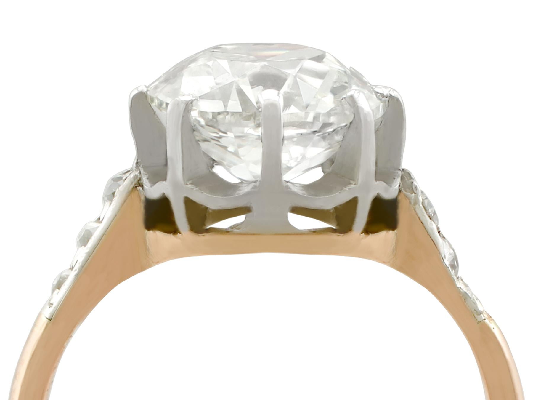 A stunning antique 2.56 carat diamond and 18 karat yellow gold, silver set solitaire style engagement ring; part of our diverse antique jewelry collections.

This stunning, fine and impressive antique diamond solitaire ring has been crafted in 18k