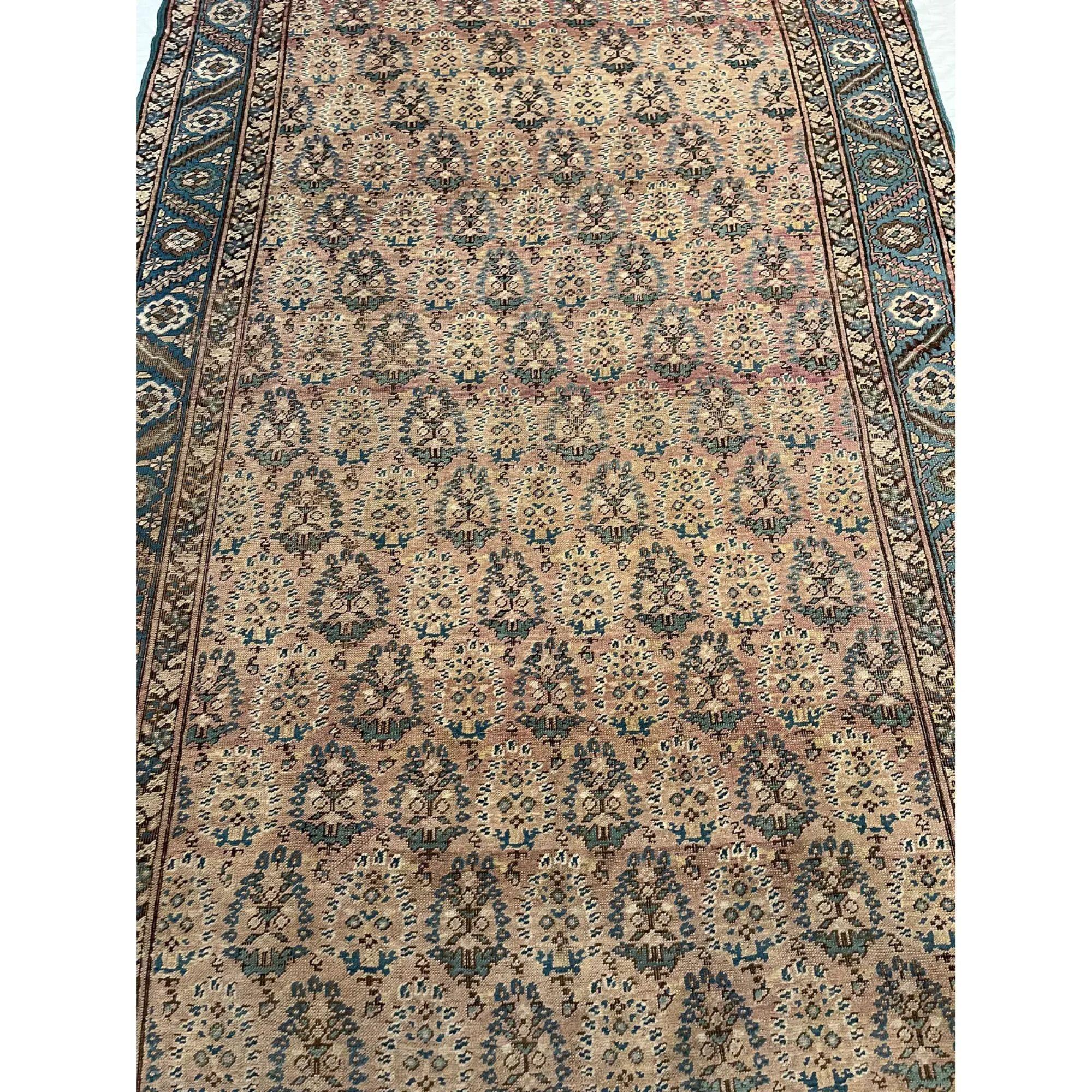 Bakshaish Rugs – Among the oversized rugs made in Persia, Bakshaish (Bakhshaish or Bakhshaysh) carpets are in a class by themselves. In essence, Bakshaish Rugs adapt the style and feeling of the finest smaller village or tribal rugs to the the scale