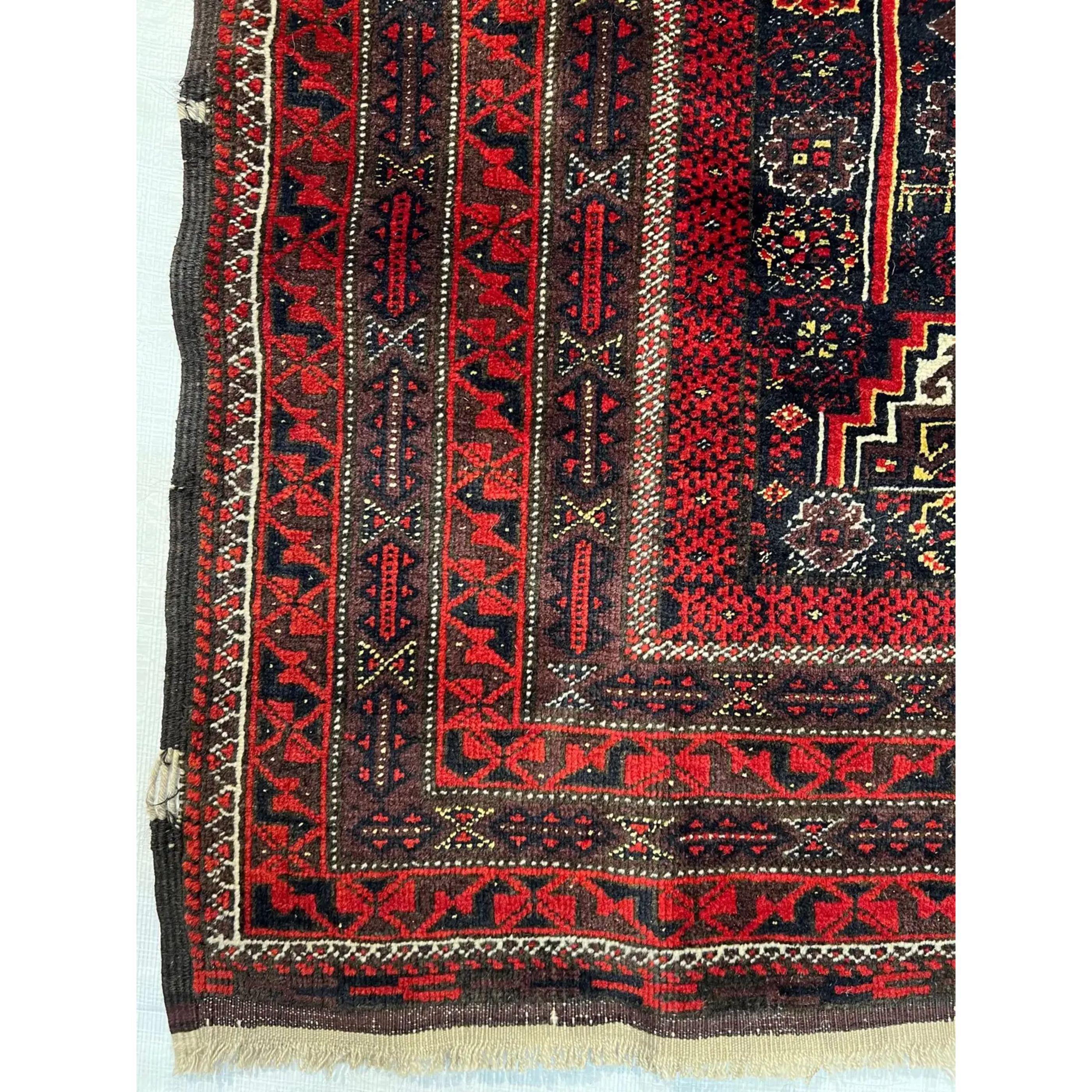 1900s Antique Persian Baloutch Rug, handmade and hand-knotted tribal carpet