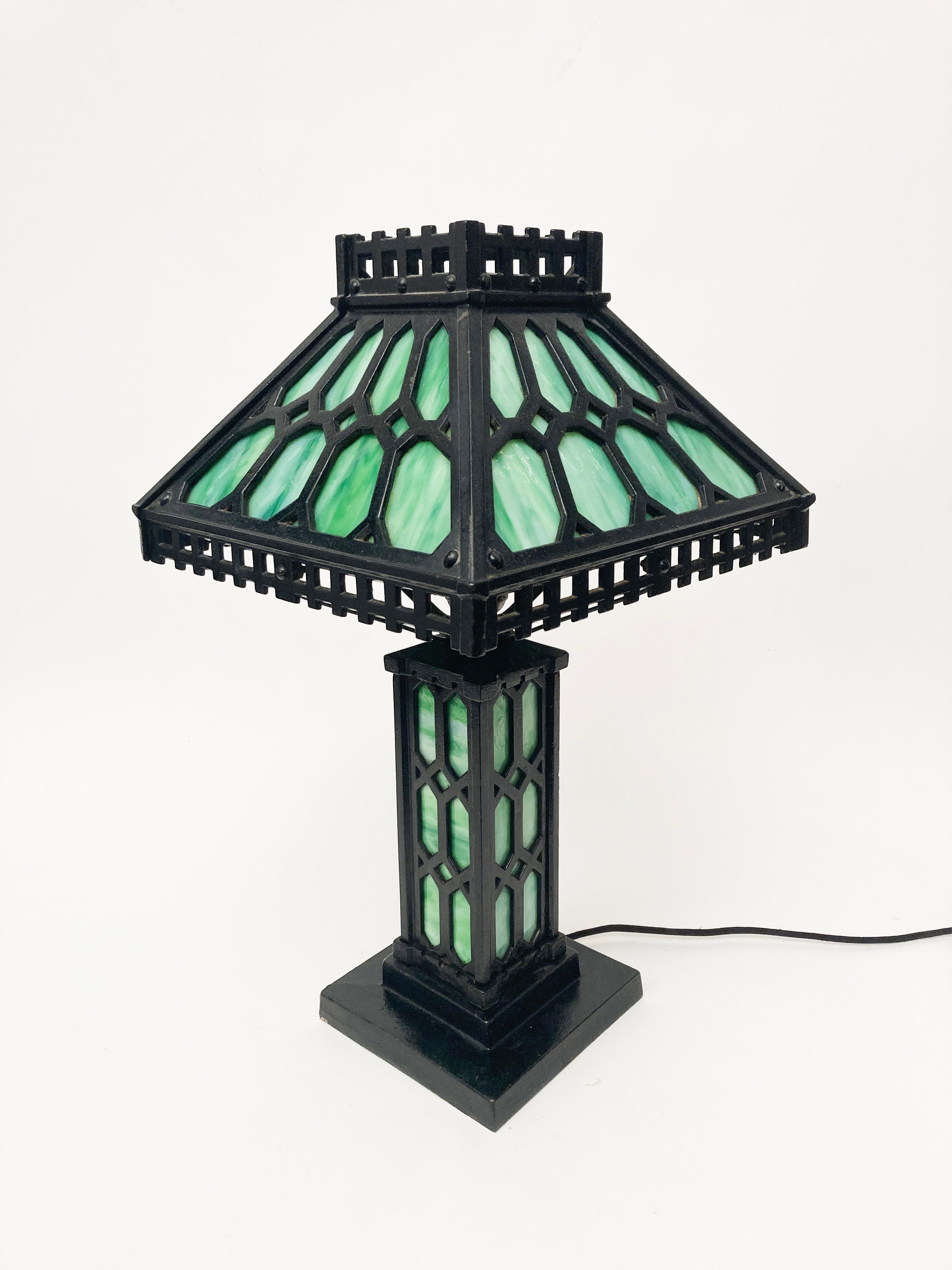 If you're a Mission period enthusiast or looking for that Arts and Crafts piece that finishes the room off with an interesting vibe, this is your lamp. Designed and crafted by Bradley & Hubbard in the early 1900's, this Mission style lamp is made of