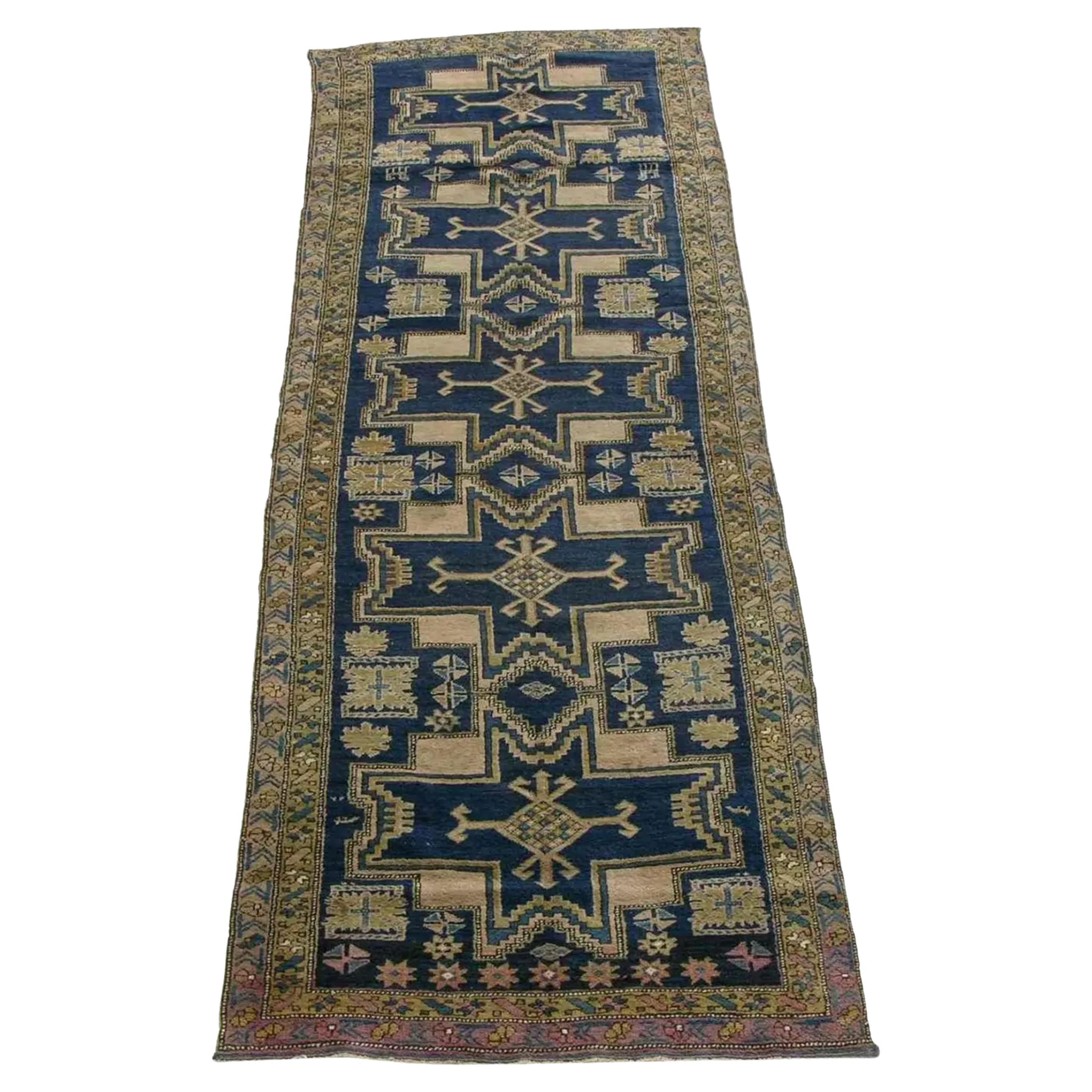 Alfombra caucásica antigua de 1900