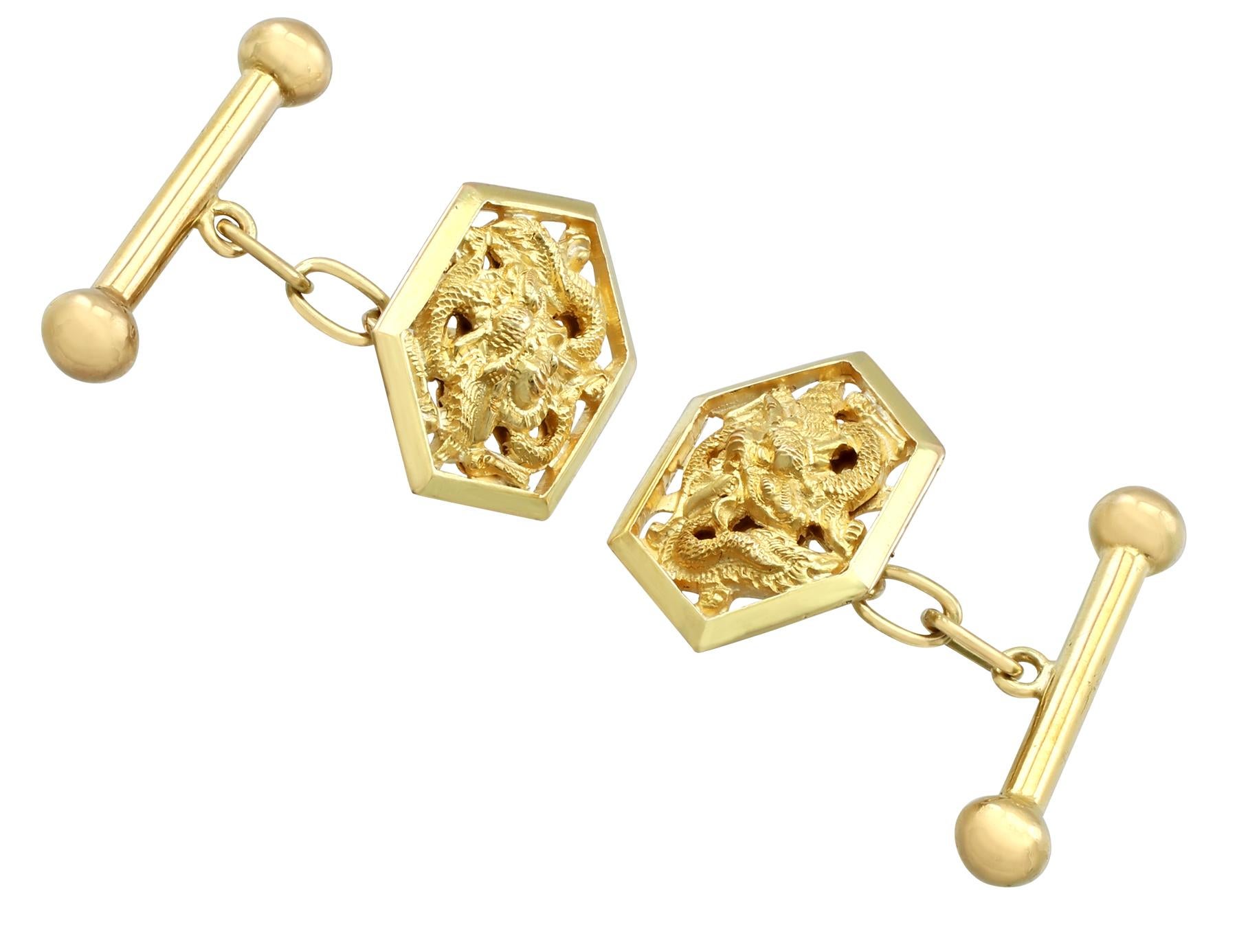 An impressive pair of antique Chinese 18 karat yellow gold 'dragon' cufflinks; part of our diverse antique jewelry and estate jewelry collections.

These fine and impressive cufflinks have been crafted in 18k yellow gold.

The anterior links have a