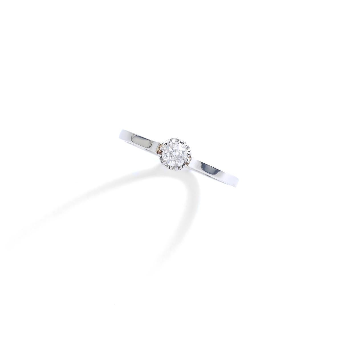 Antique Diamond 0.15 carat Solitaire Platinum and white Gold Ring. 
Circa 1900.

Gross weight: 1.25 grams.