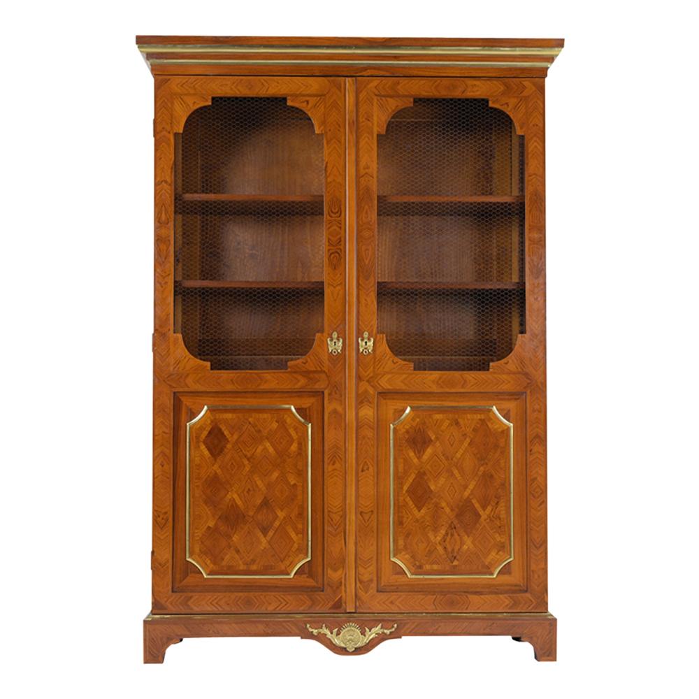 Carved Antique French Louis XVI-Style Walnut Bookcase with Marquetry and Brass Details For Sale