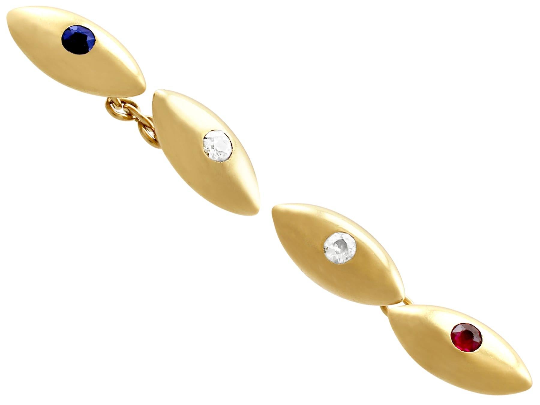 An impressive pair of antique French 0.33 carat sapphire and 0.30 carat ruby, 0.59 carat diamond and 18 karat yellow gold cufflinks; part of our diverse antique jewelry collections.

These fine and impressive gold cufflinks have been crafted in 18k
