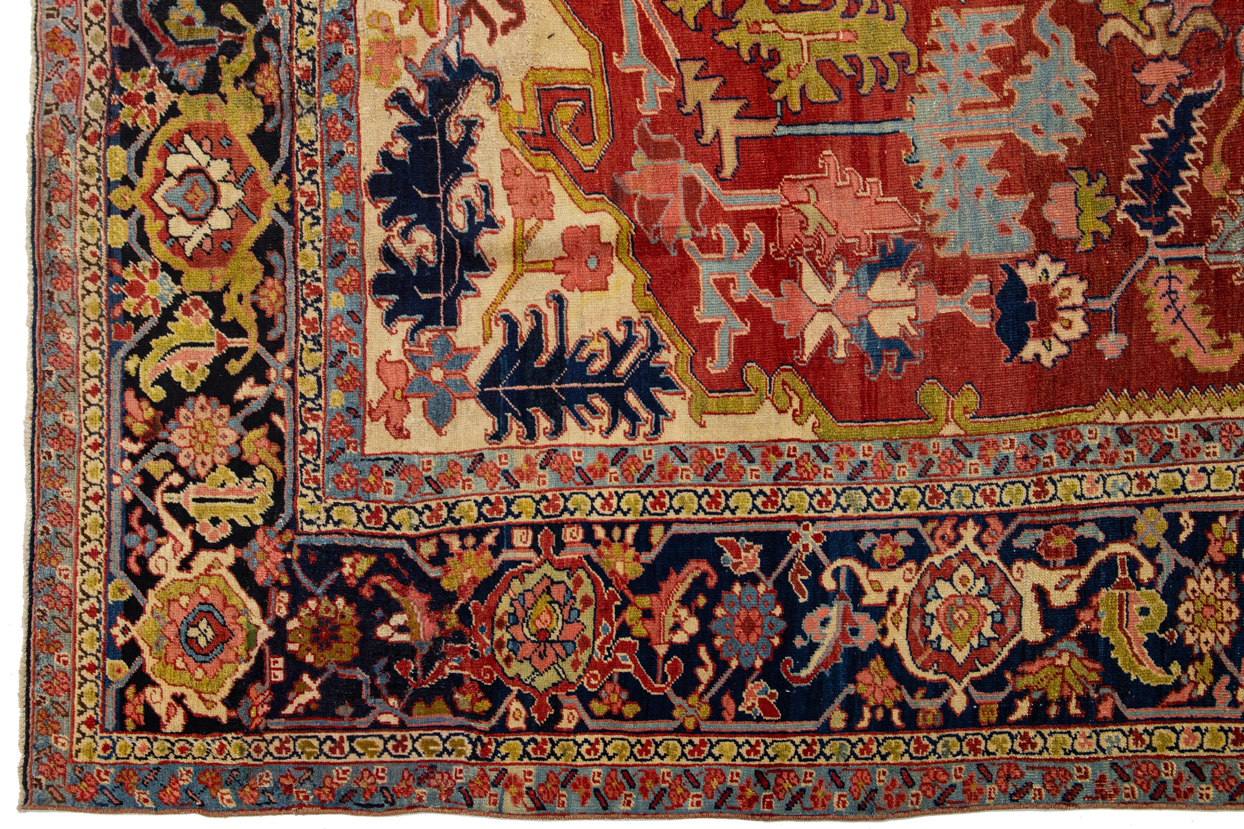 20th Century 1900s Antique Handmade Wool Rug Persian Heriz Featuring a Medallion Motif  For Sale