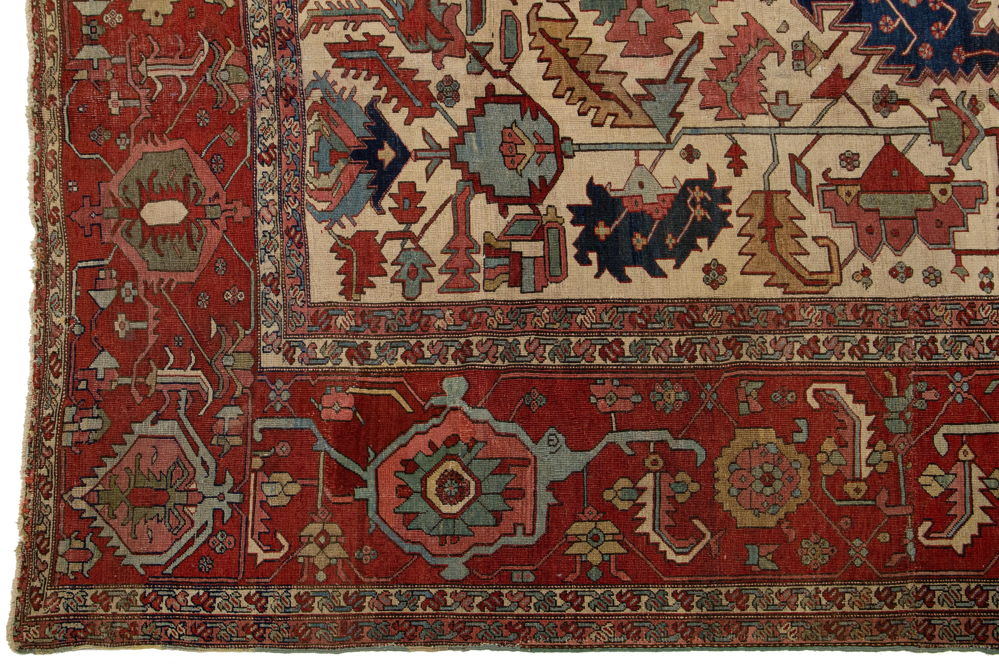 20th Century 1900s Antique Handmade Wool Rug Persian Serapi Featuring a Allover Motif  For Sale