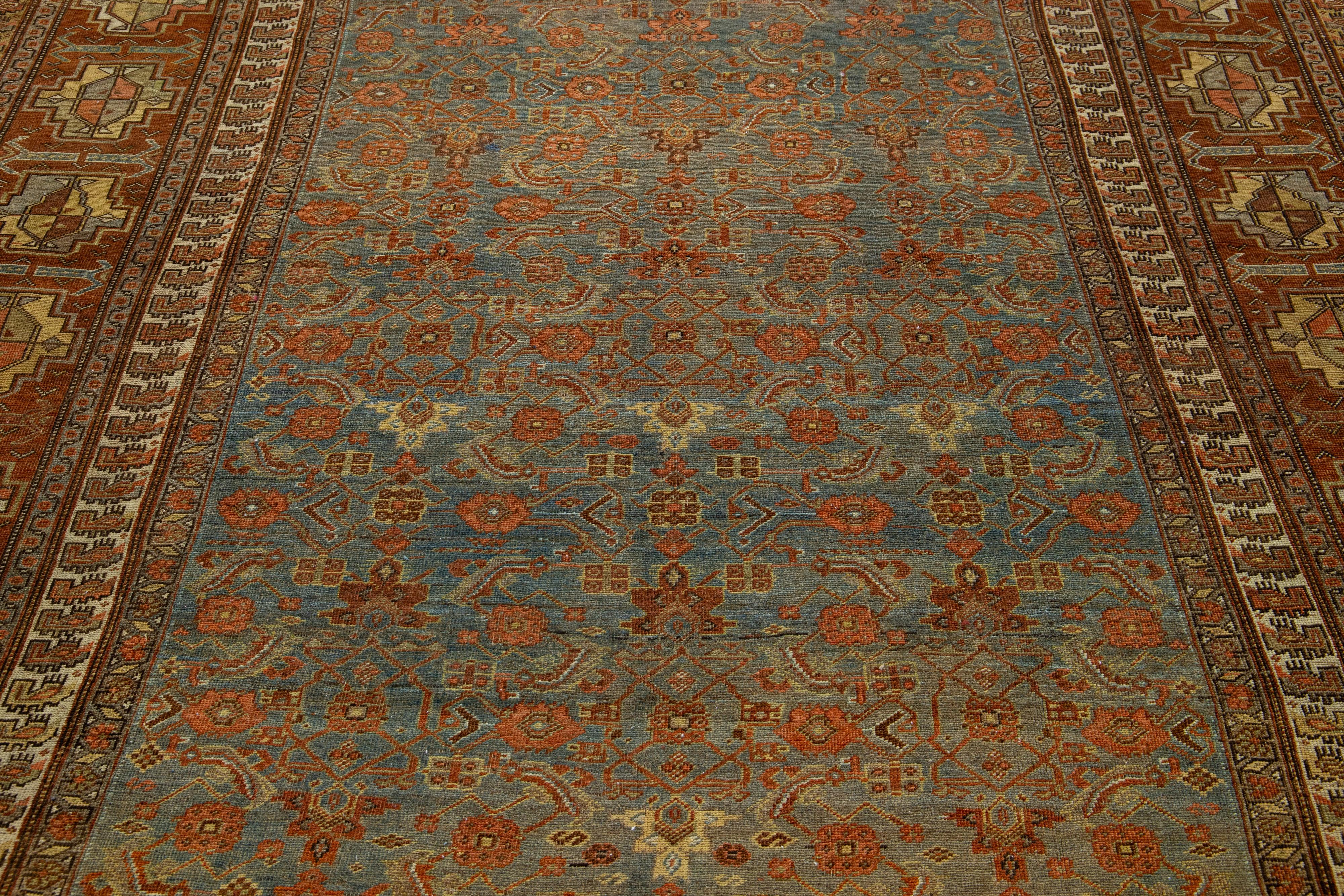 20th Century 1900s Antique Persian Bidjar Wool Runner in Blue With Allover Floral Motif For Sale