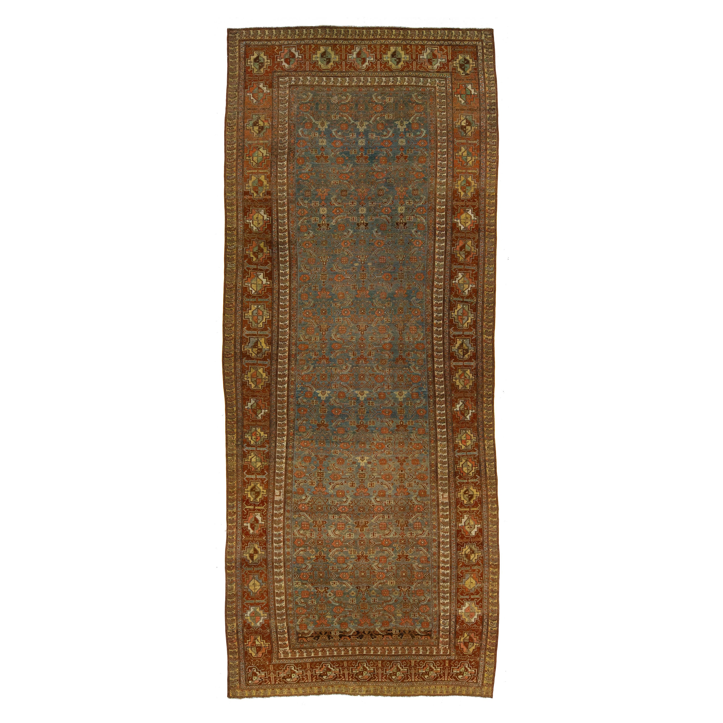 Antico runner persiano in lana Bidjar del 1900 in blu con motivo floreale a tutto campo