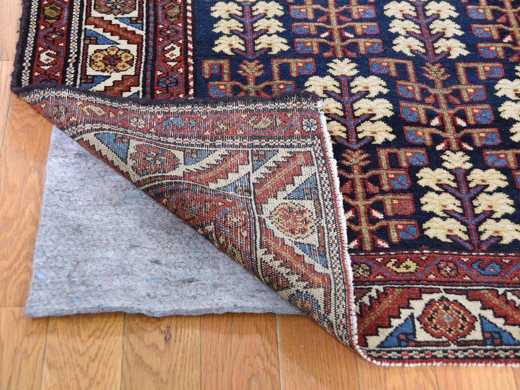 This is a genuine hand knotted oriental rug. It is not hand tufted or machine made rug. Our entire inventory is made of either hand knotted or handwoven rugs.

Bring life to your home with this admirable pure wool rug, it is an original antique