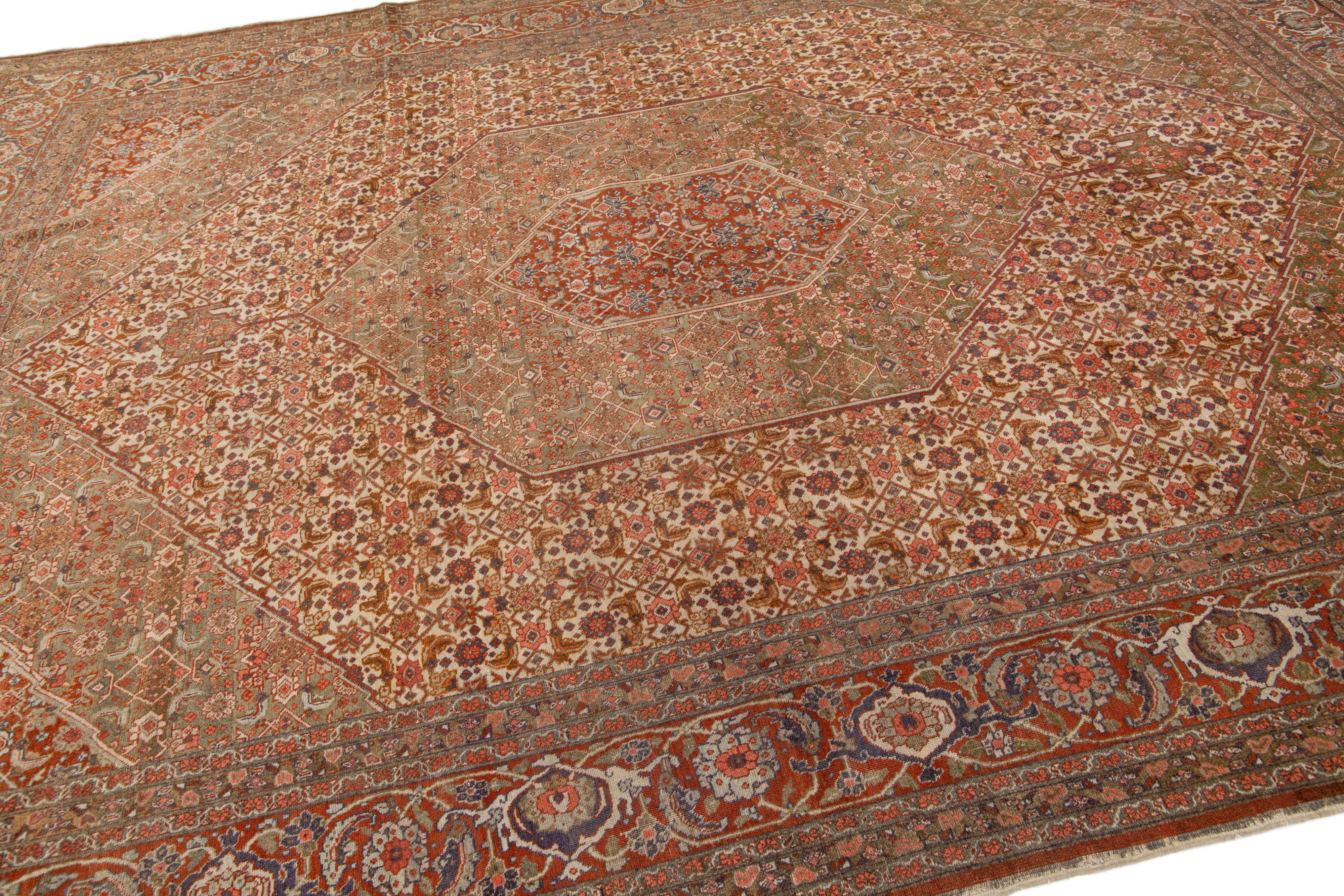 Hand-Knotted 1900's Antique Persian Tabriz Beige Wool Rug with Allover Motif For Sale