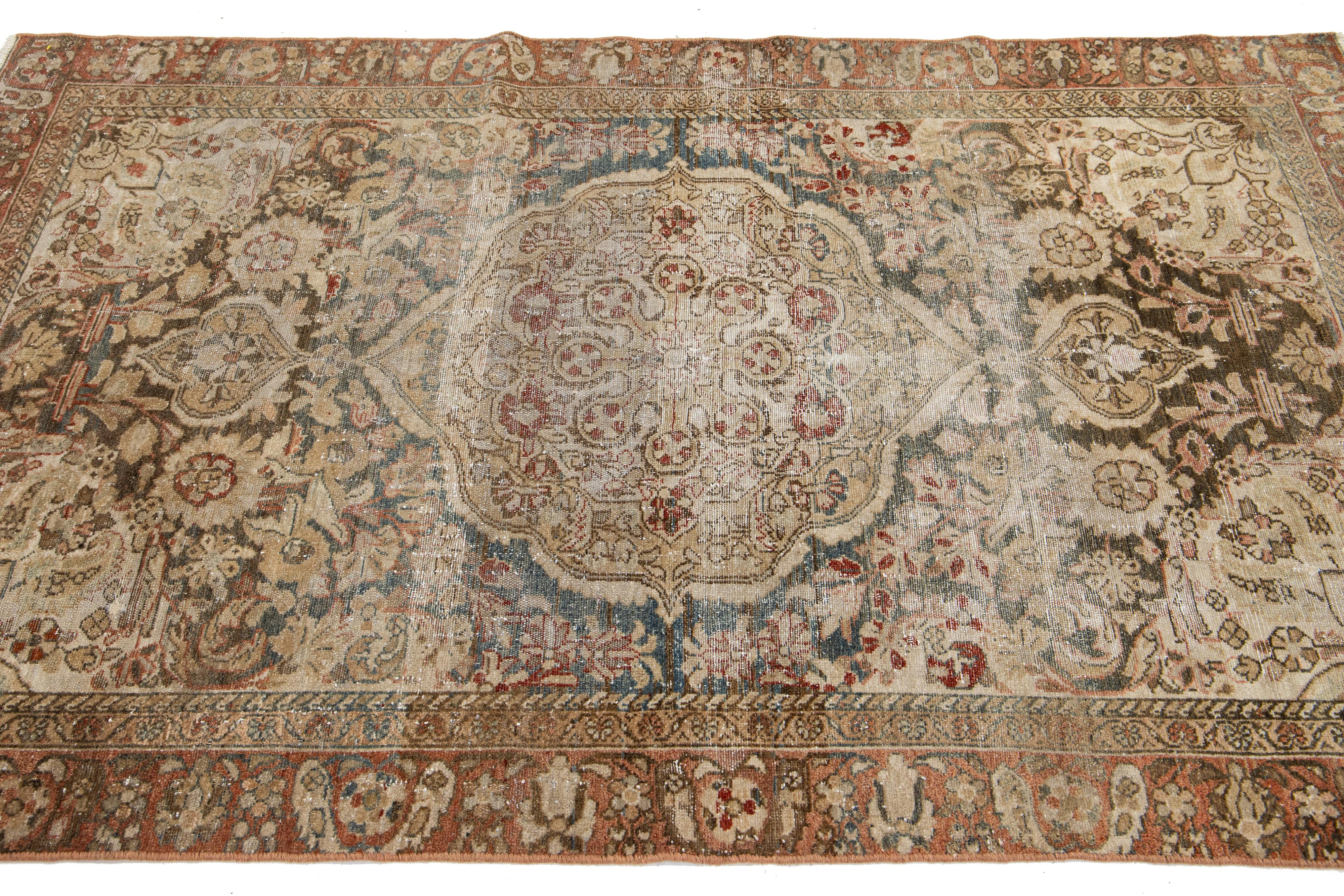 1900s Antique Persian Tabriz Handmade Wool Rug with Medallion Motif In Excellent Condition For Sale In Norwalk, CT