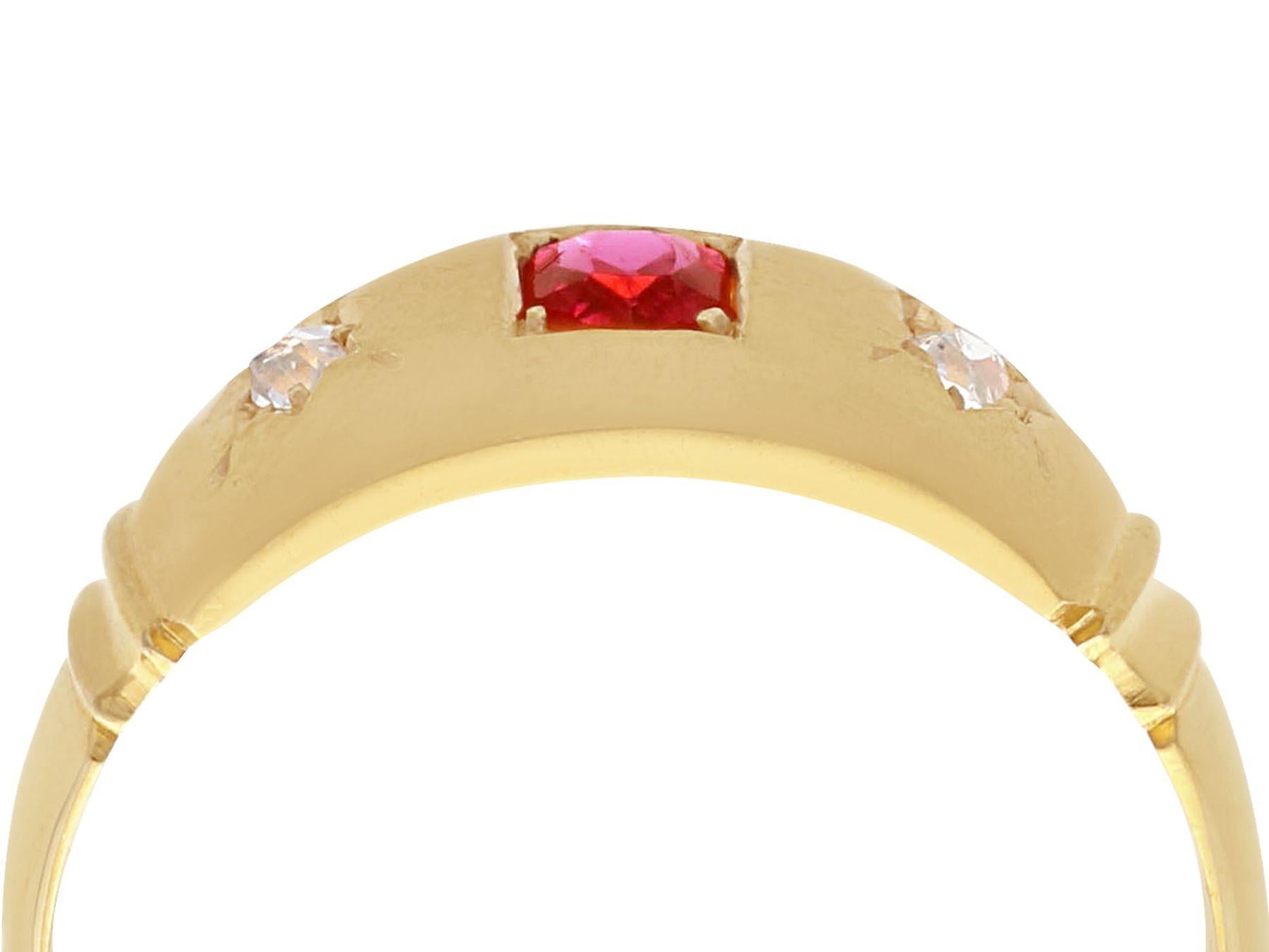 A fine antique 0.25 carat ruby and 0.08 carat diamond dress ring in 18 karat yellow gold; part of our antique jewelry and estate jewelry collections

This fine antique ruby and gold band ring has been crafted in 18k yellow gold.

The ring displays a