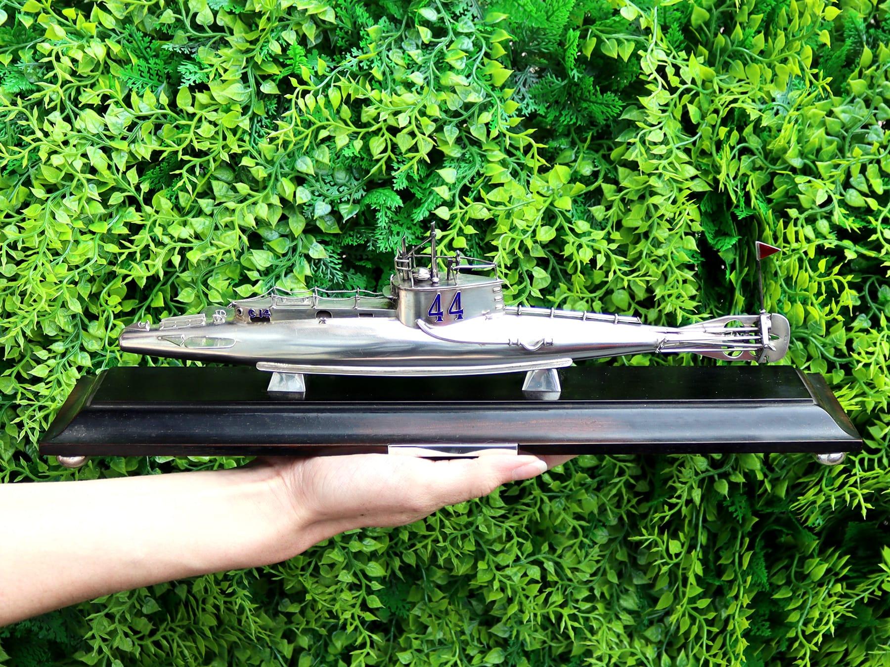 An exceptional, fine and impressive unusual antique sterling silver presentation submarine on plinth; an addition to our transportation related silverware collection

This exceptional and unusual, antique George V English sterling silver