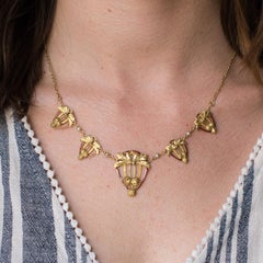 1900s Art Nouveau Gold Natural Pearl Enamel Drapery Necklace