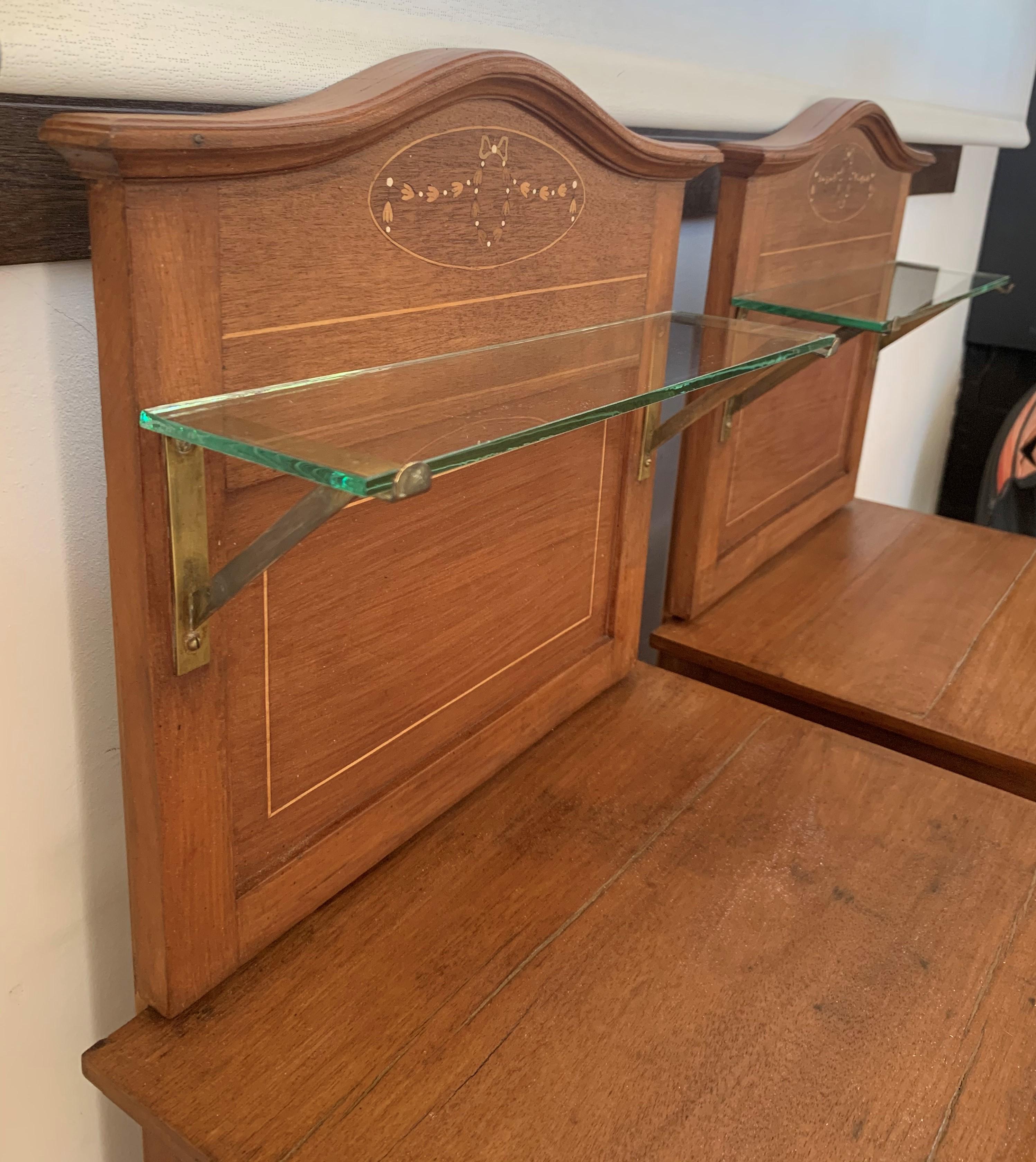 Modern 1900s, Art Nouveau Pair of Walnut Nightstands with Crest and Glass Shelve For Sale