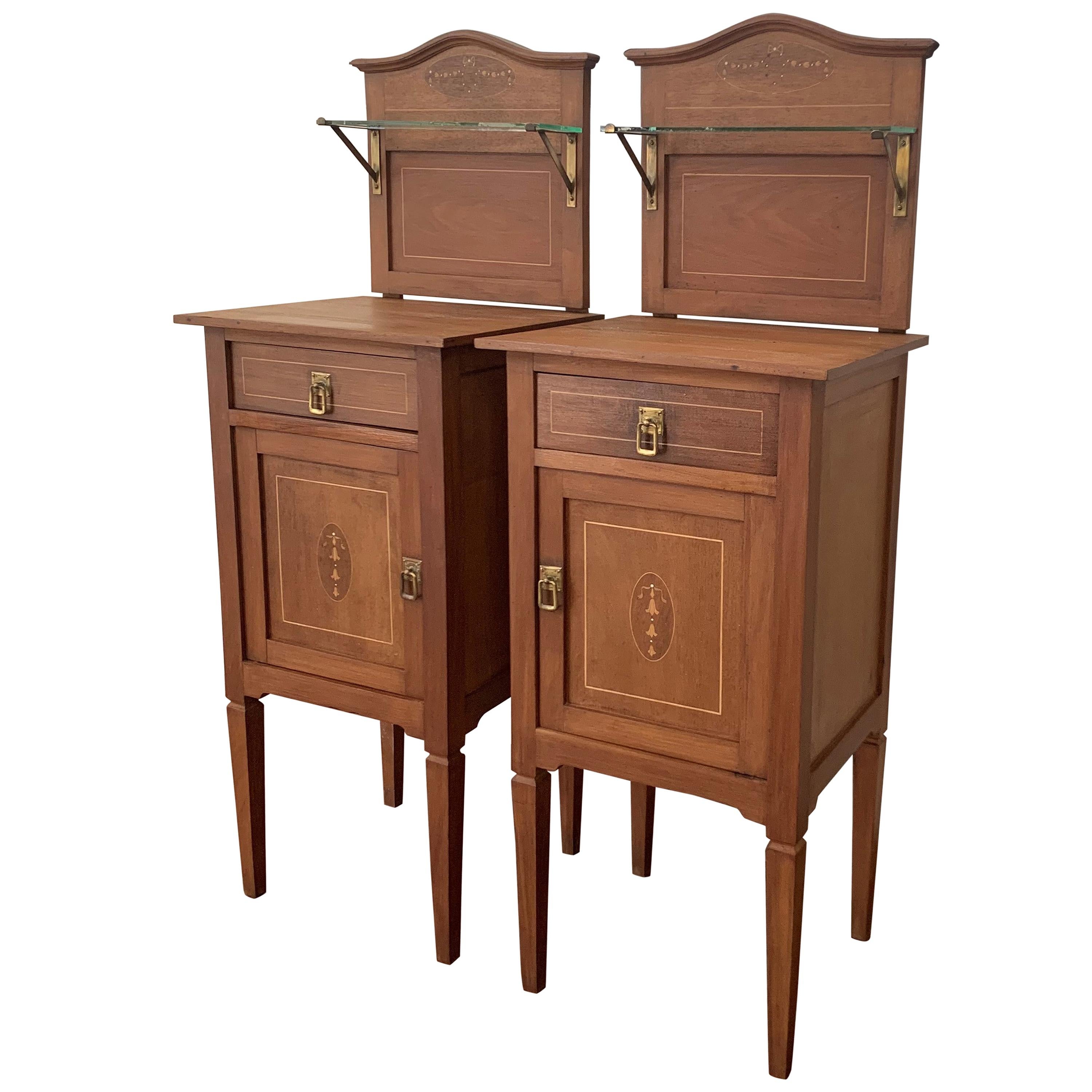 1900s, Art Nouveau Pair of Walnut Nightstands with Crest and Glass Shelve