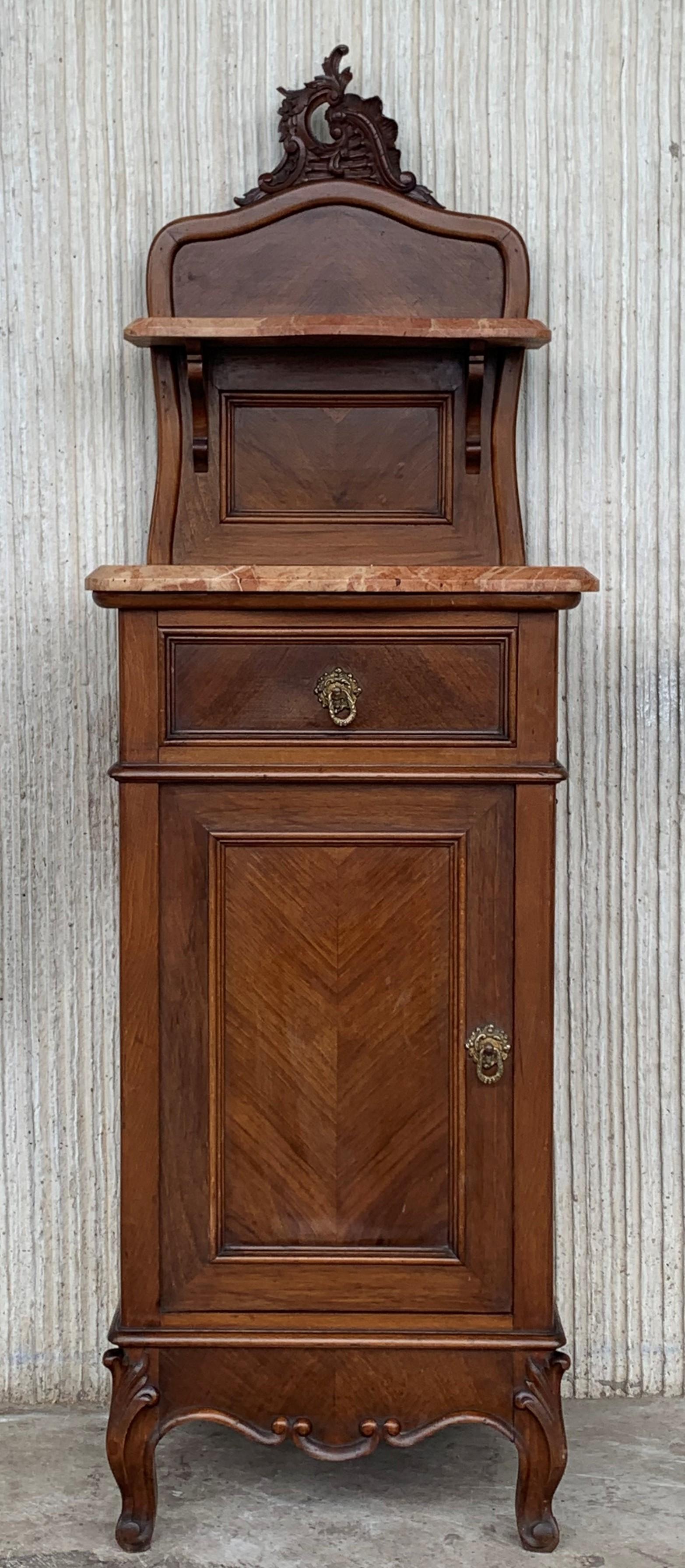 Late 19th century Art Nouveau pair of nightstands in walnut, bronze handles, restored and polished to wax.
Measures: Height to the top 52.75in
Height to the table 33.26in.