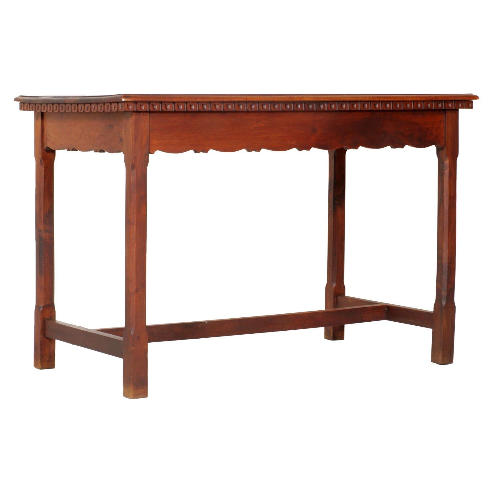 Early 20th century Wiener occasional table, writing desk Art Nouveau, all solid walnut restored and wax polished.  This wiener werkstatte table, with the dimensions of a desk, recovered in Tyrol has exceptional lines and proportions with the edge of