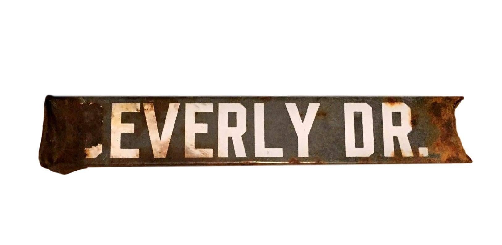 Vintage Beverly Hills street sign, circa 1900s. Beverly Dr. The main street that runs north/south through all of Beverly Hills. Double sided. Two feet wide. Great piece of Hollywood ephemera.