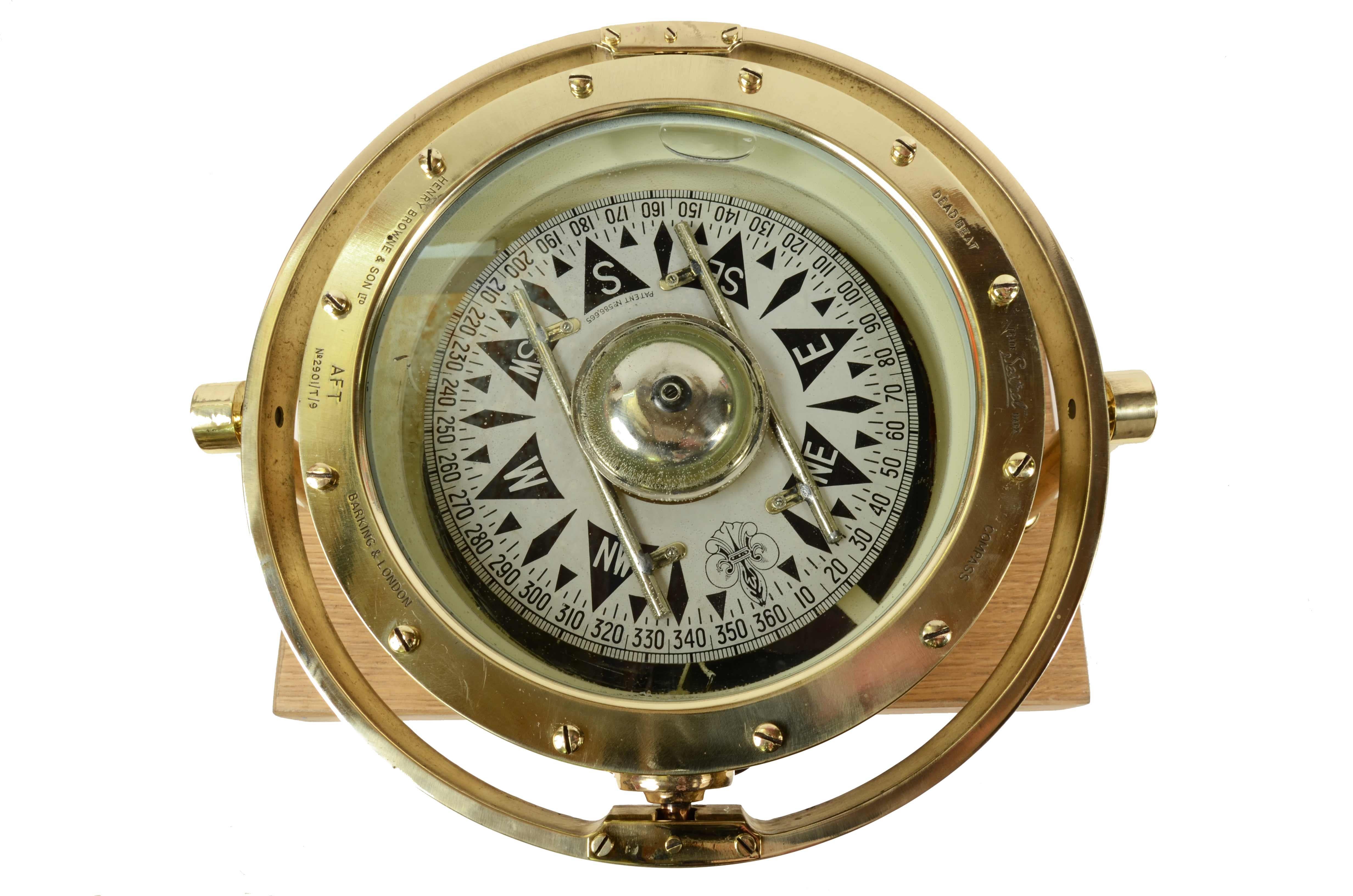 Magnetic big nautical compass, signed Henry Browne & Son Ltd Sestrel Made in England, N. AFT 2901/T/9 Barking & London, early 1900s. 
Mounted on a custom-made wooden and brass board. 
Very good condition. 
Diameter compass inche 9, height base