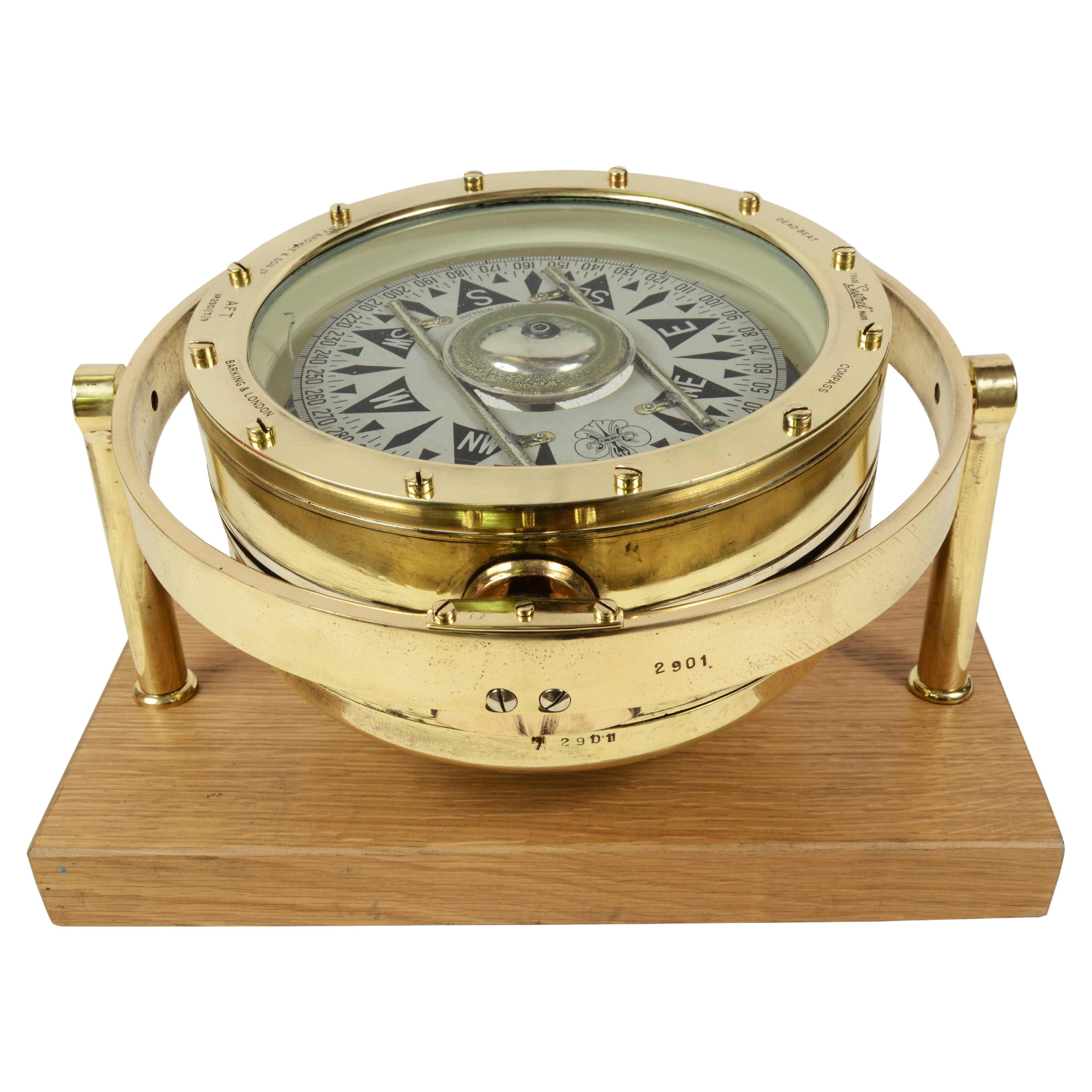Nautical Compass Of Brass And Glass Made In The Early 1900s On A Walnut Board For Sale At