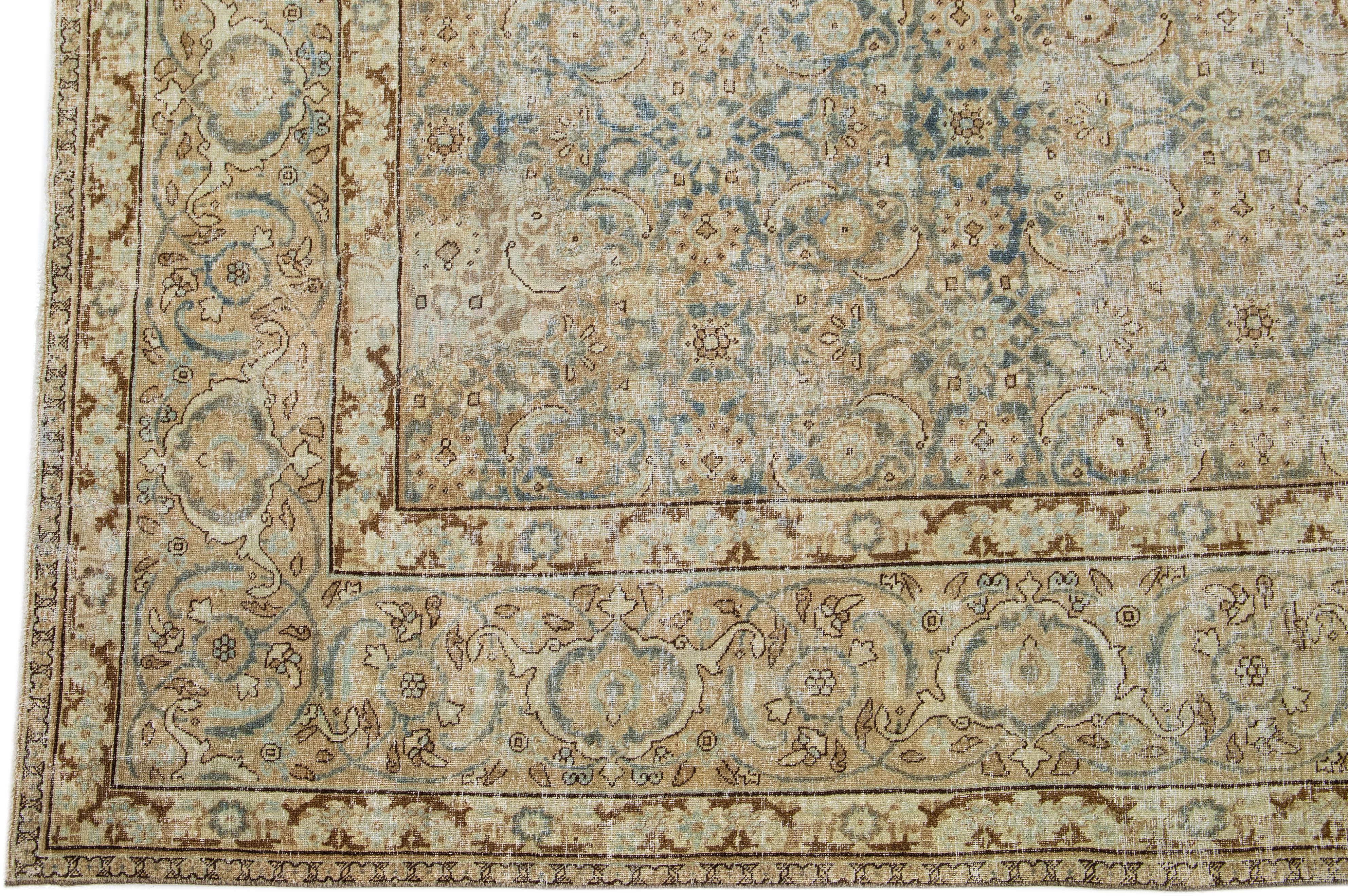 20ième siècle Tapis persan ancien bleu des années 1900, conçu par Tabriz, avec motif floral en vente
