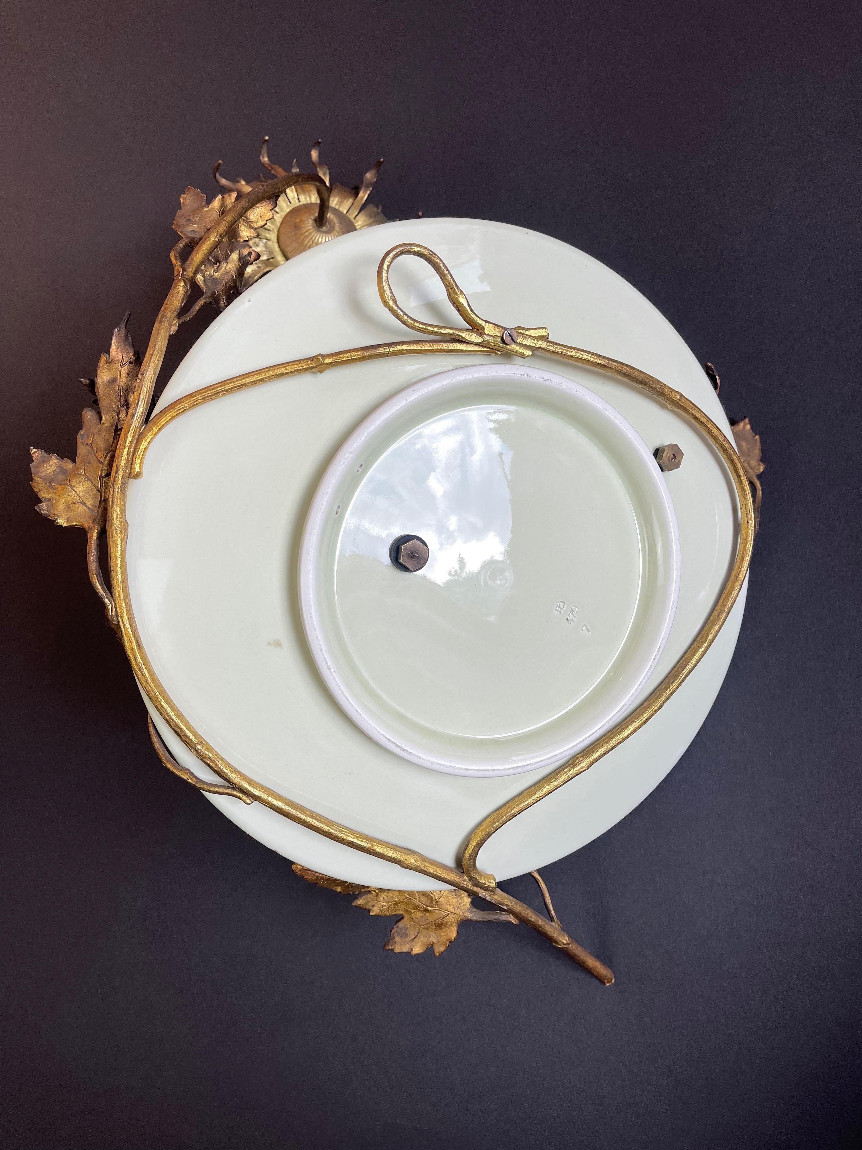 1900s Bronze Cherub on Ceramic Plate & Sunburst Gilt Metal Floral Decor, Belgium For Sale 5
