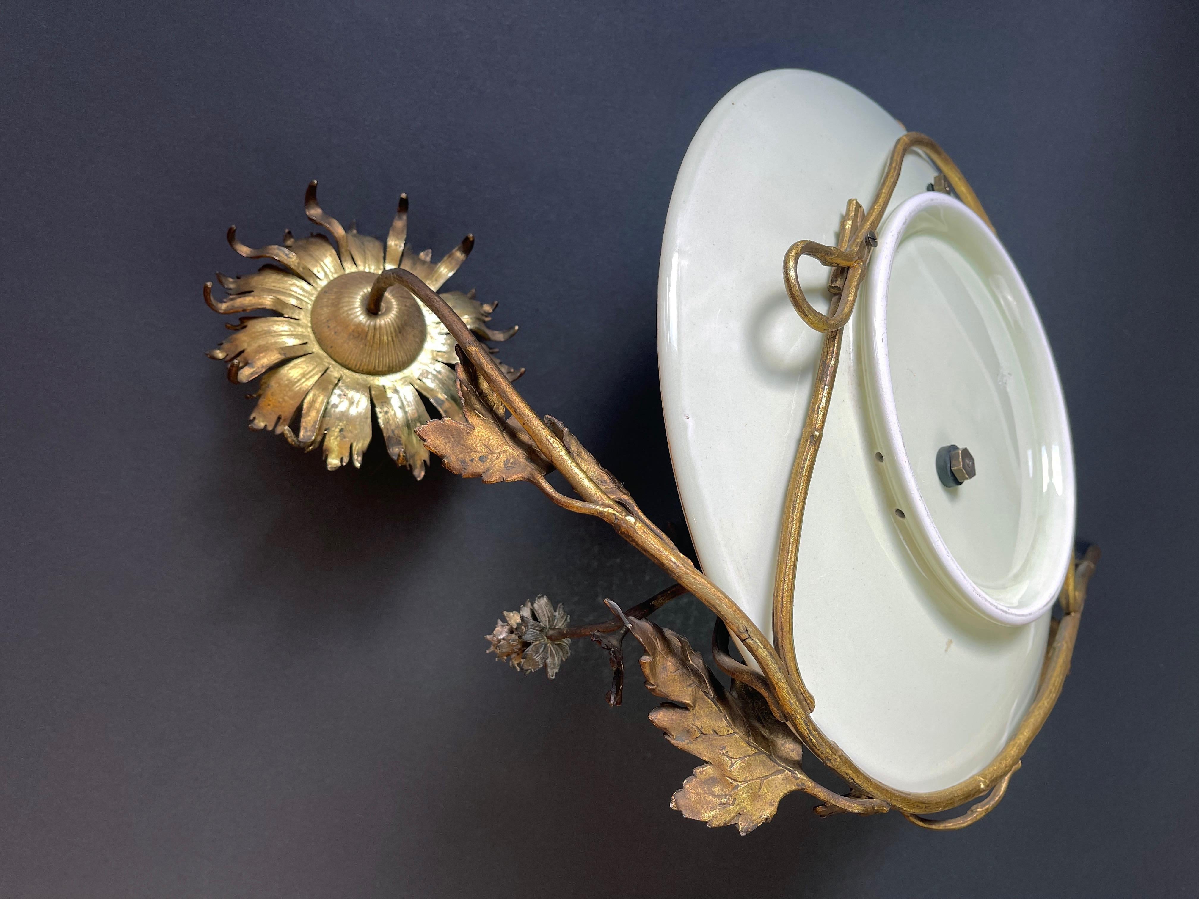 Belgian 1900s Bronze Cherub on Ceramic Plate & Sunburst Gilt Metal Floral Decor, Belgium For Sale