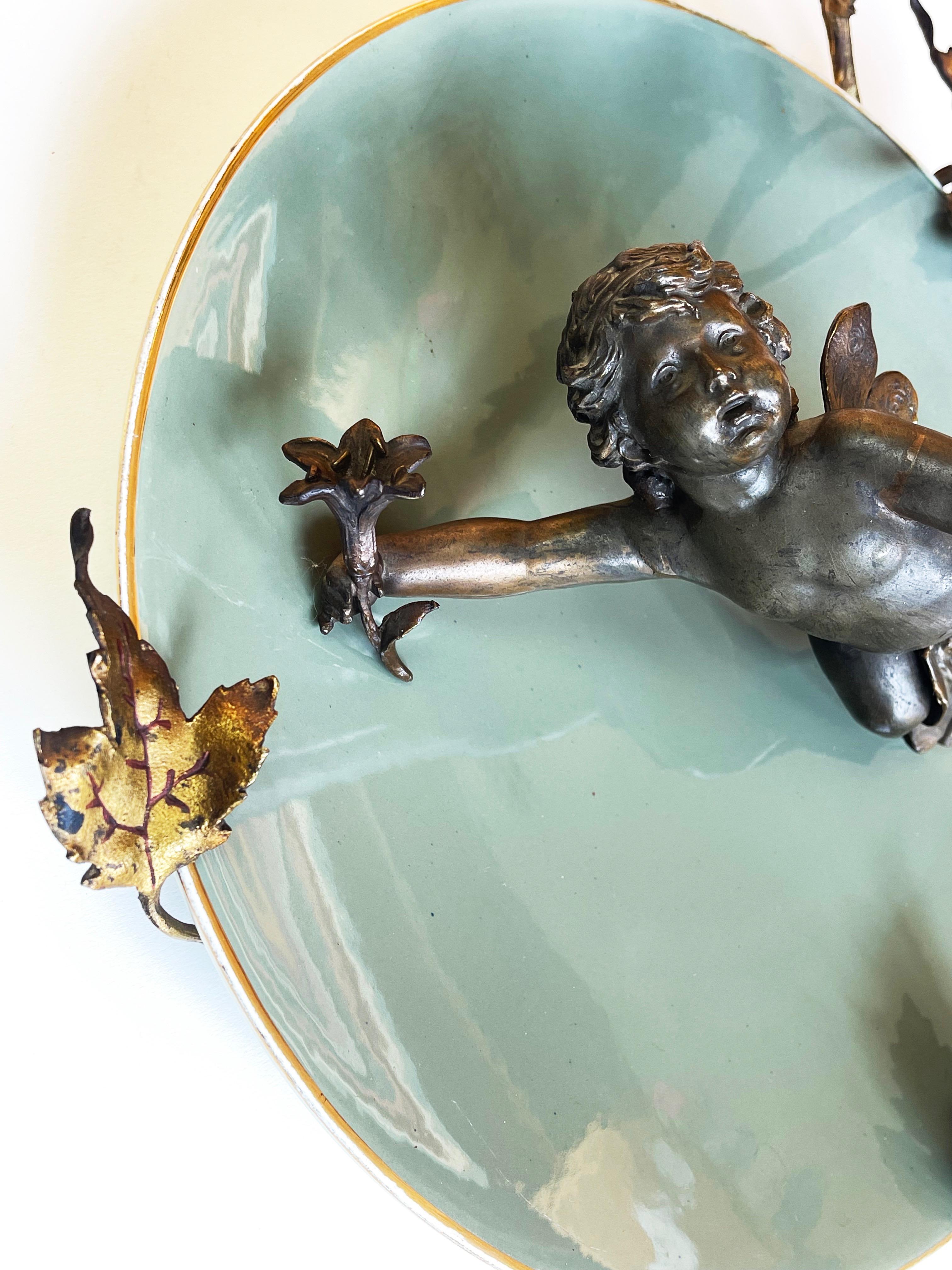 1900s Bronze Cherub on Ceramic Plate & Sunburst Gilt Metal Floral Decor, Belgium In Good Condition For Sale In Andernach, DE
