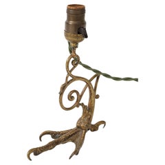 Lampada da tavolo "artigli d'aquila" in bronzo del 1900