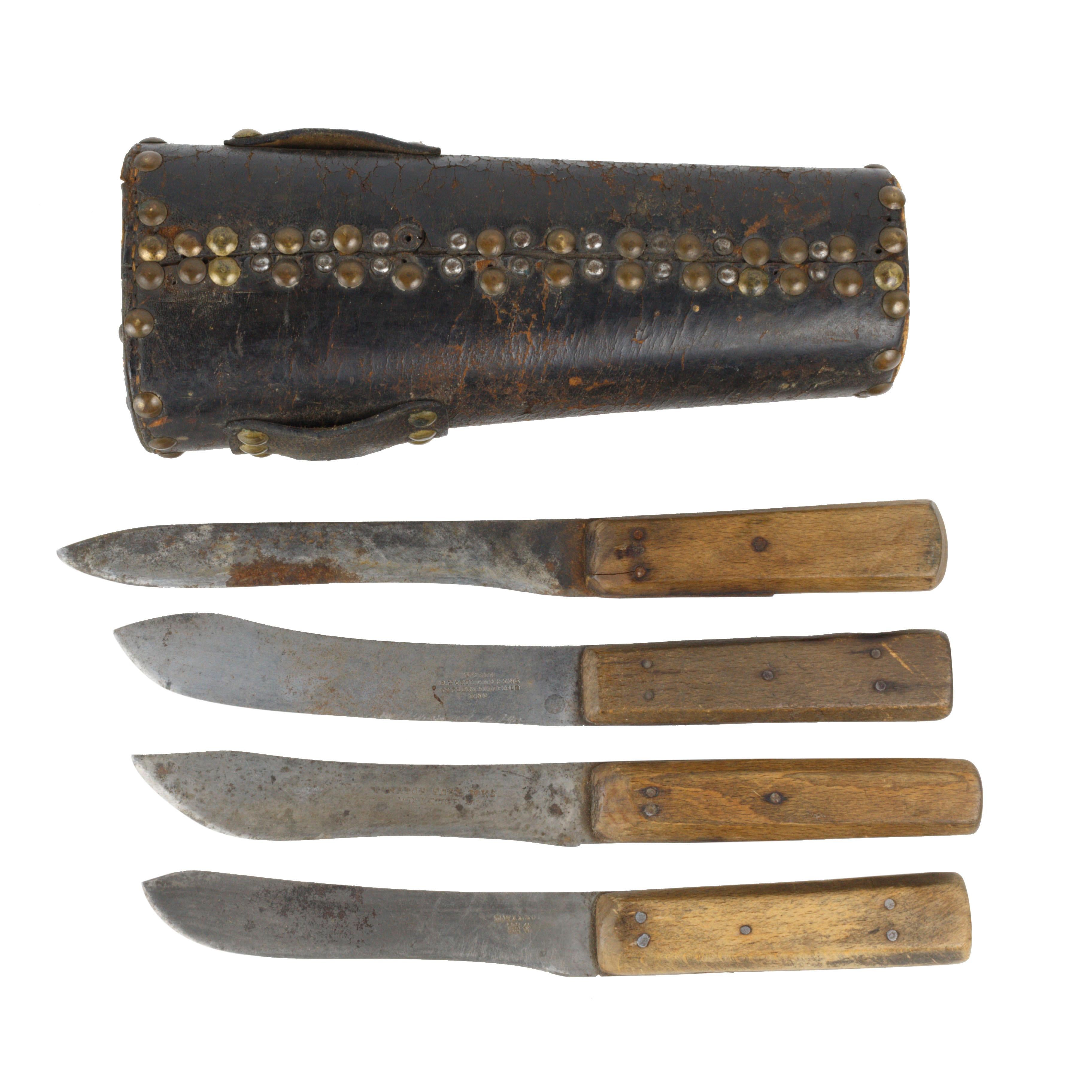 Buffalo hunter skinning set of 4 knives in leather covered wood pouch with tacks. First knife as 6.75