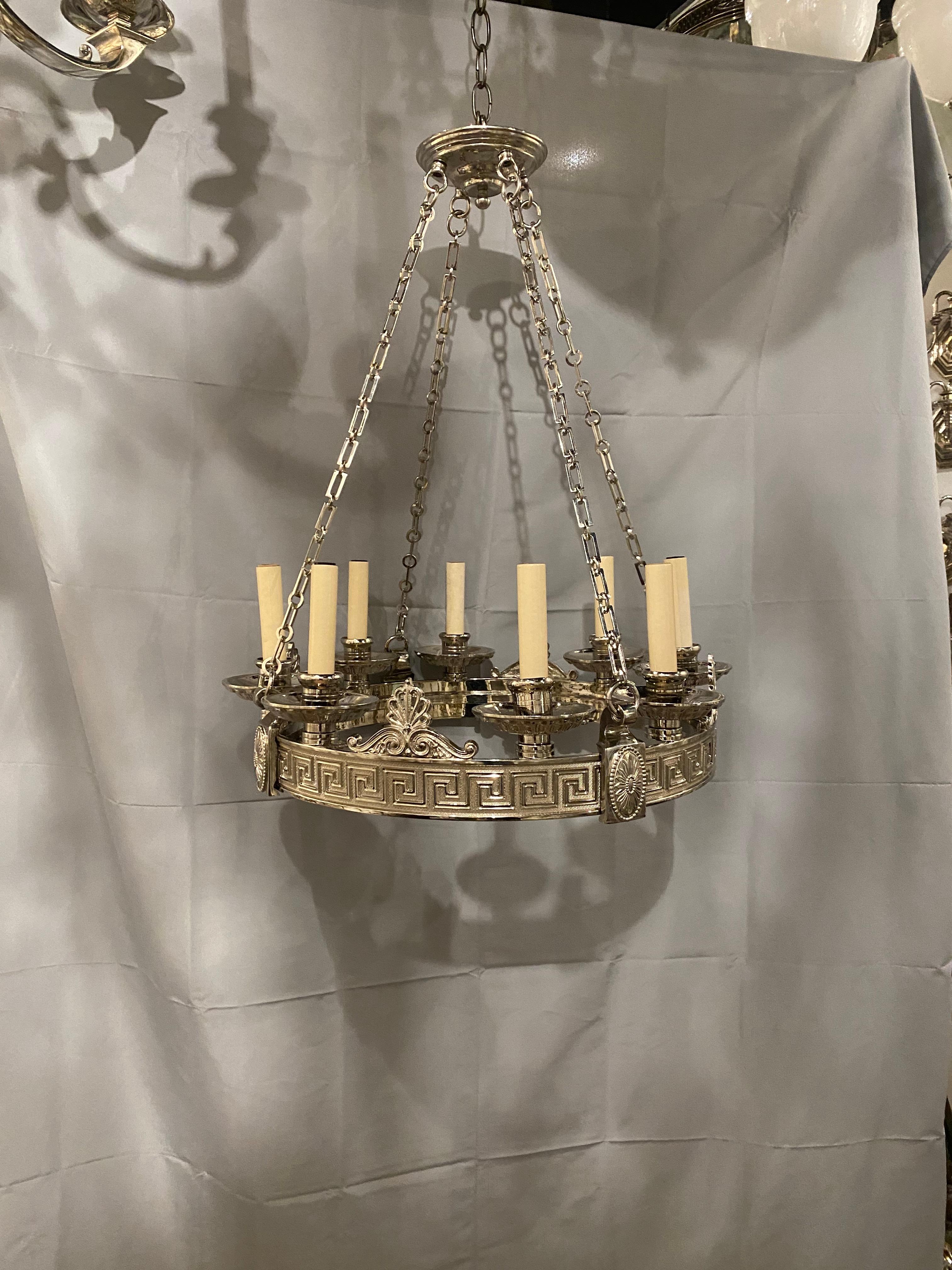 A circa 1900 silver plated Caldwell 8 lights chandelier with Greek key design (set available) 