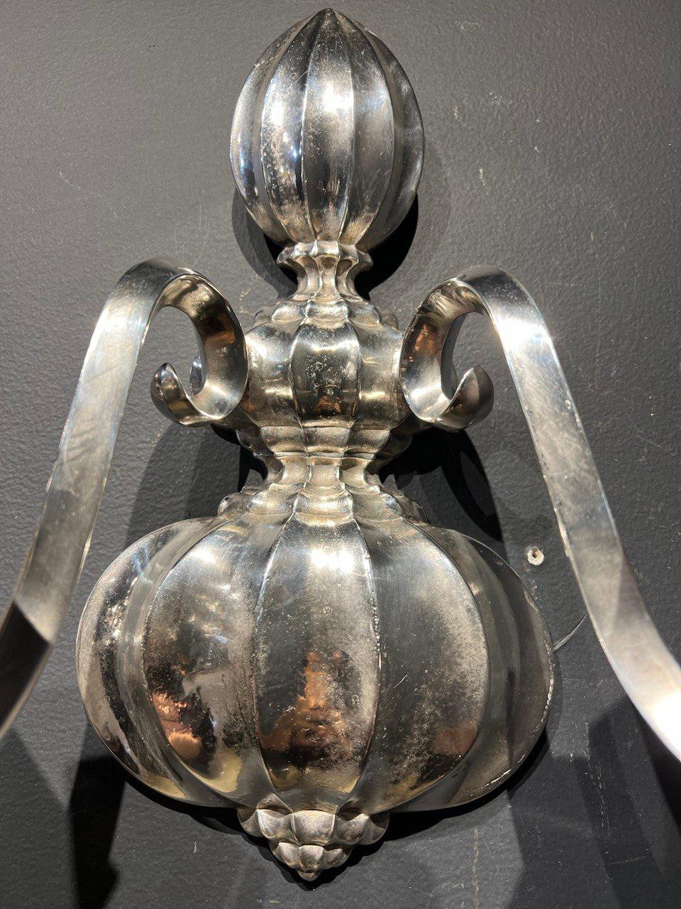 A pair of 1900 silver plated Caldwell sconces with two lights