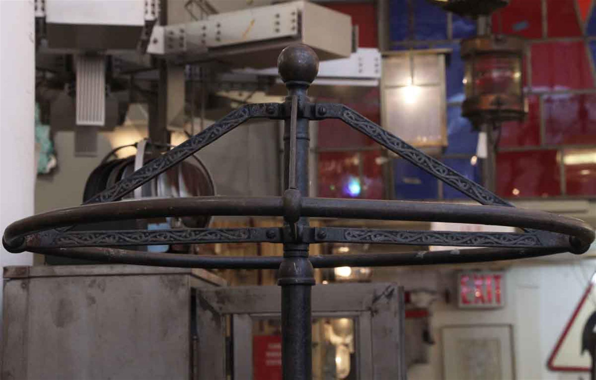 Circular cast iron spinner or rotary clothes rack from the 1900s. This can be seen at our 5 East 16th St location on Union Square in Manhattan.